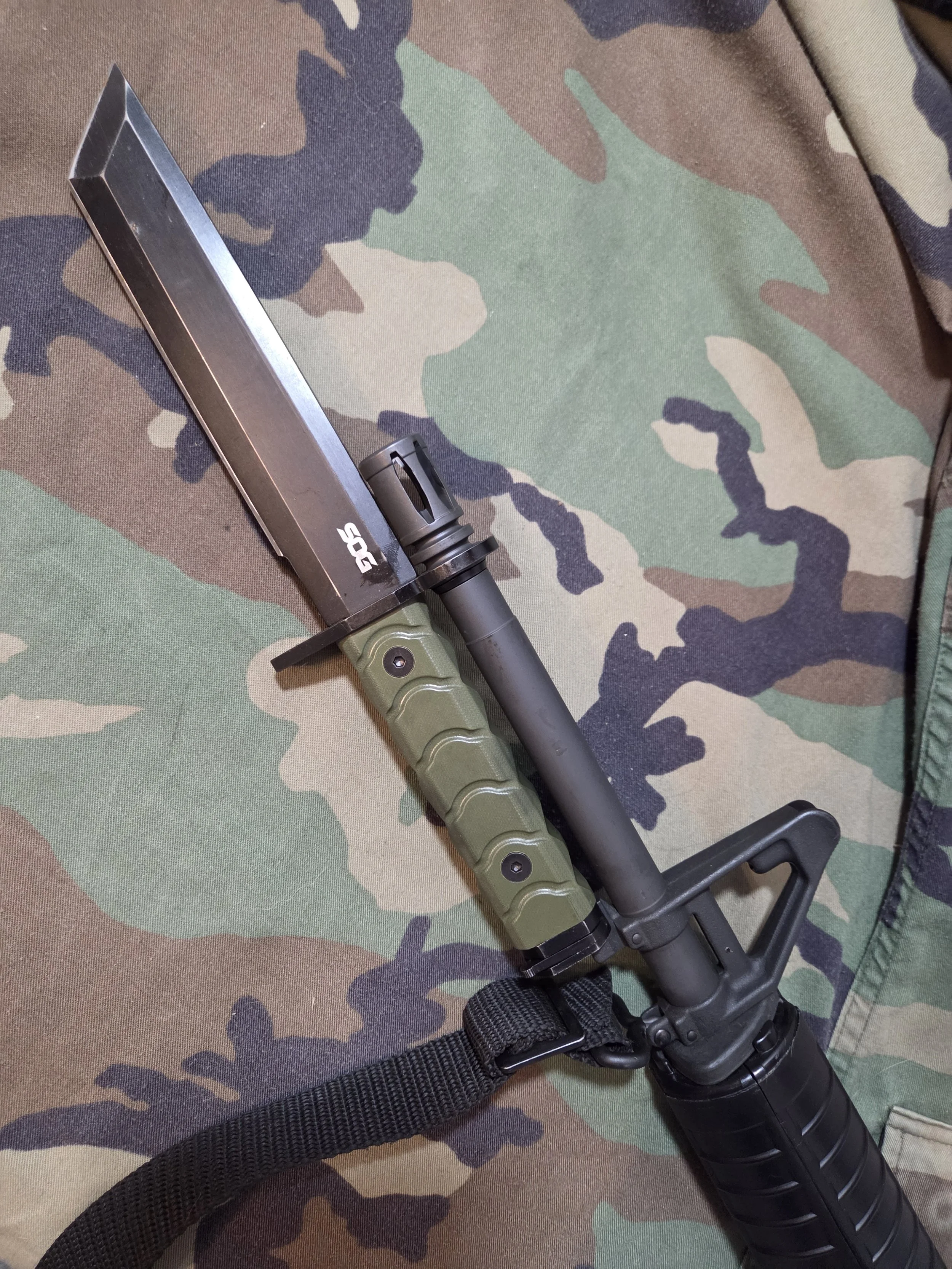 SOG Bayonet attached to the bayonet lug of the SA-16 A2 rifle