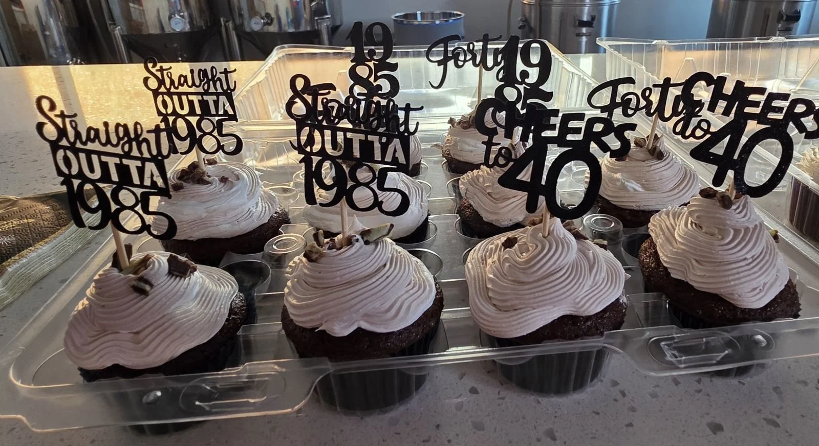 Custom Birthday Cupcakes are pictured.