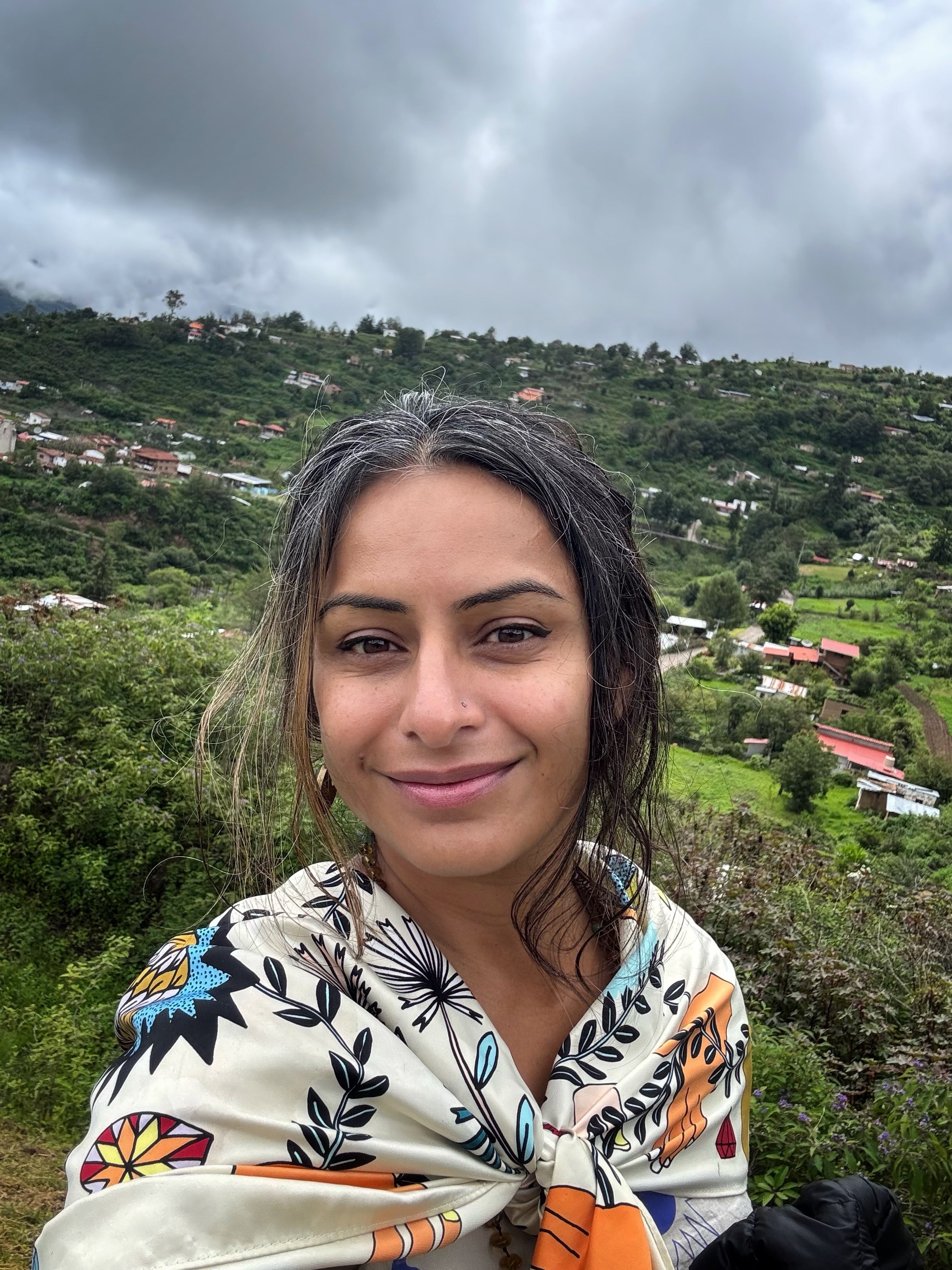 Woman after indigenous ceremony with plants