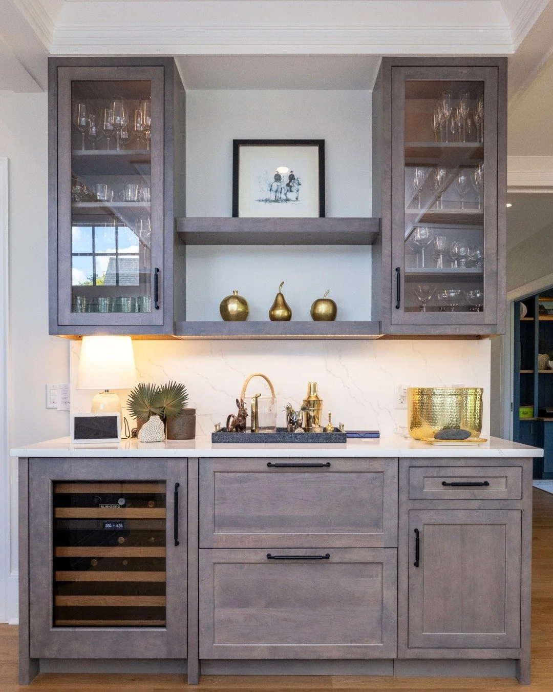 Sophisticated design meets everyday function.

This custom bar features rich wood cabinetry, brass accents, and tailored details, a perfect blend of craftsmanship and modern elegance.

#BuiltByShepard #LuxuryHomes #CustomDesignBuild #SouthShoreLiving