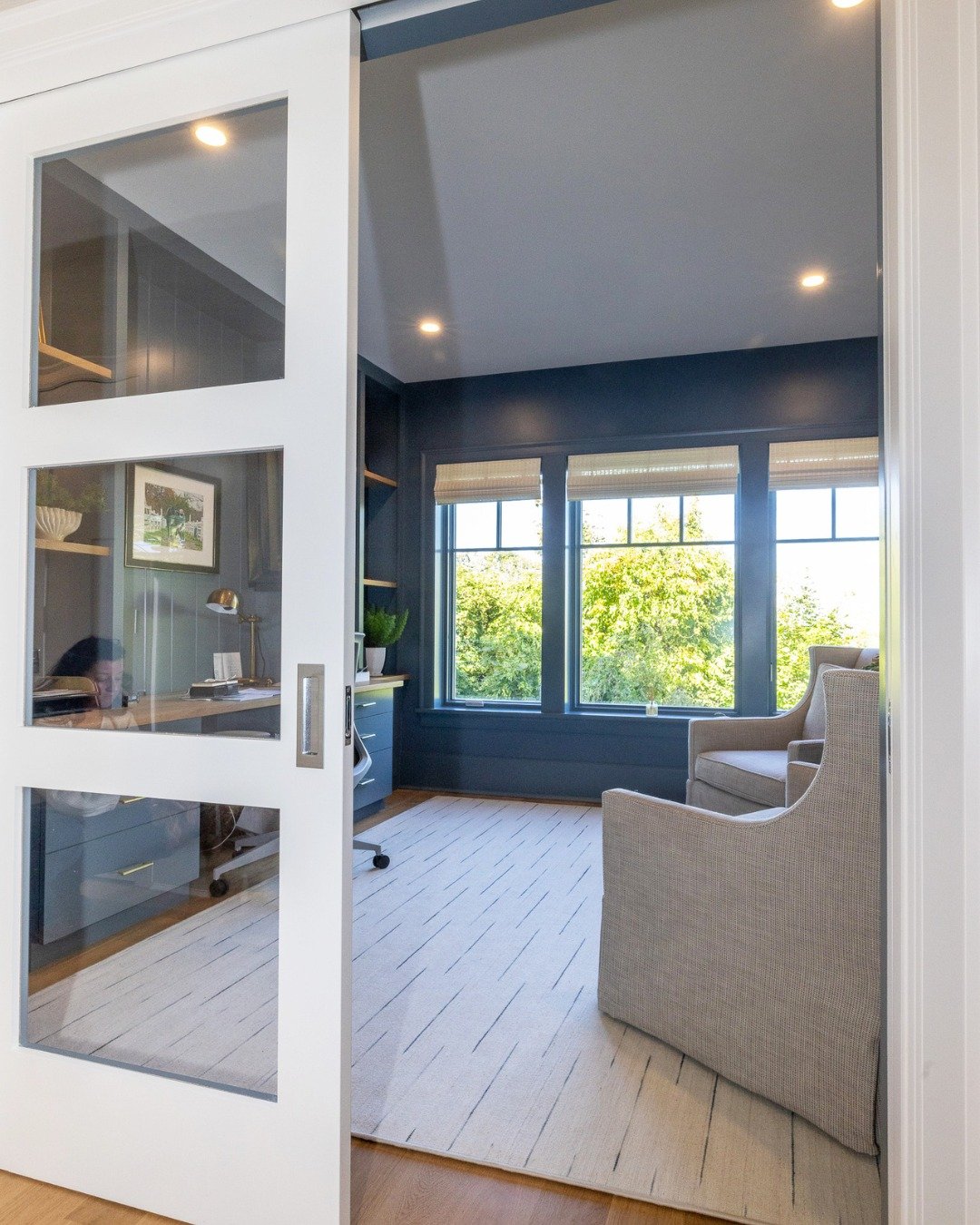 Inspired by the colors of the coast.

This home office blends refined millwork with a serene wave-washed wallpaper, creating a space that feels sophisticated, grounded, and full of light. Every inch reflects the attention to detail that defines Shepa