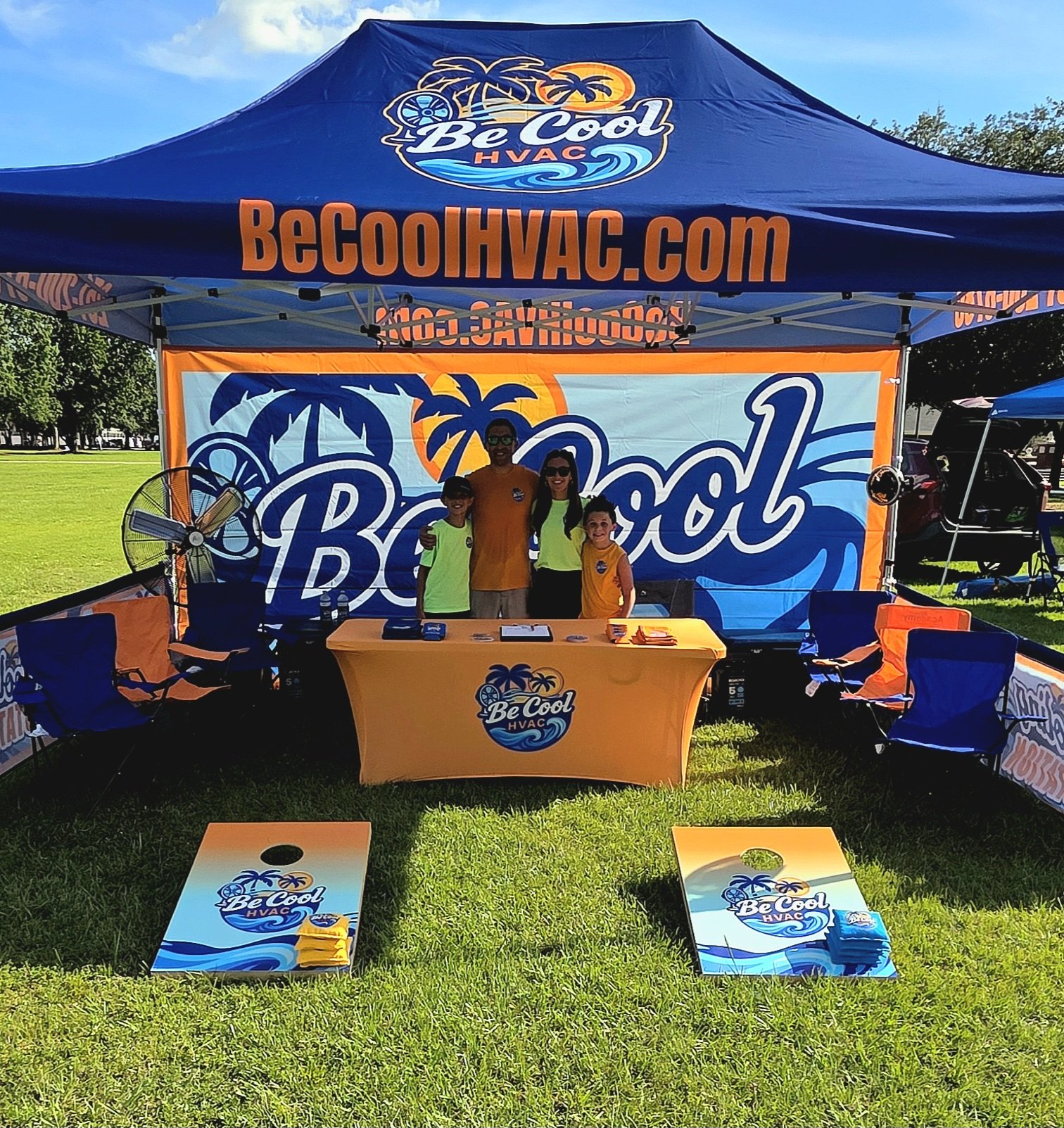 Be Cool HVAC Owners and Family at Trade Show Booth Near Foley, AL