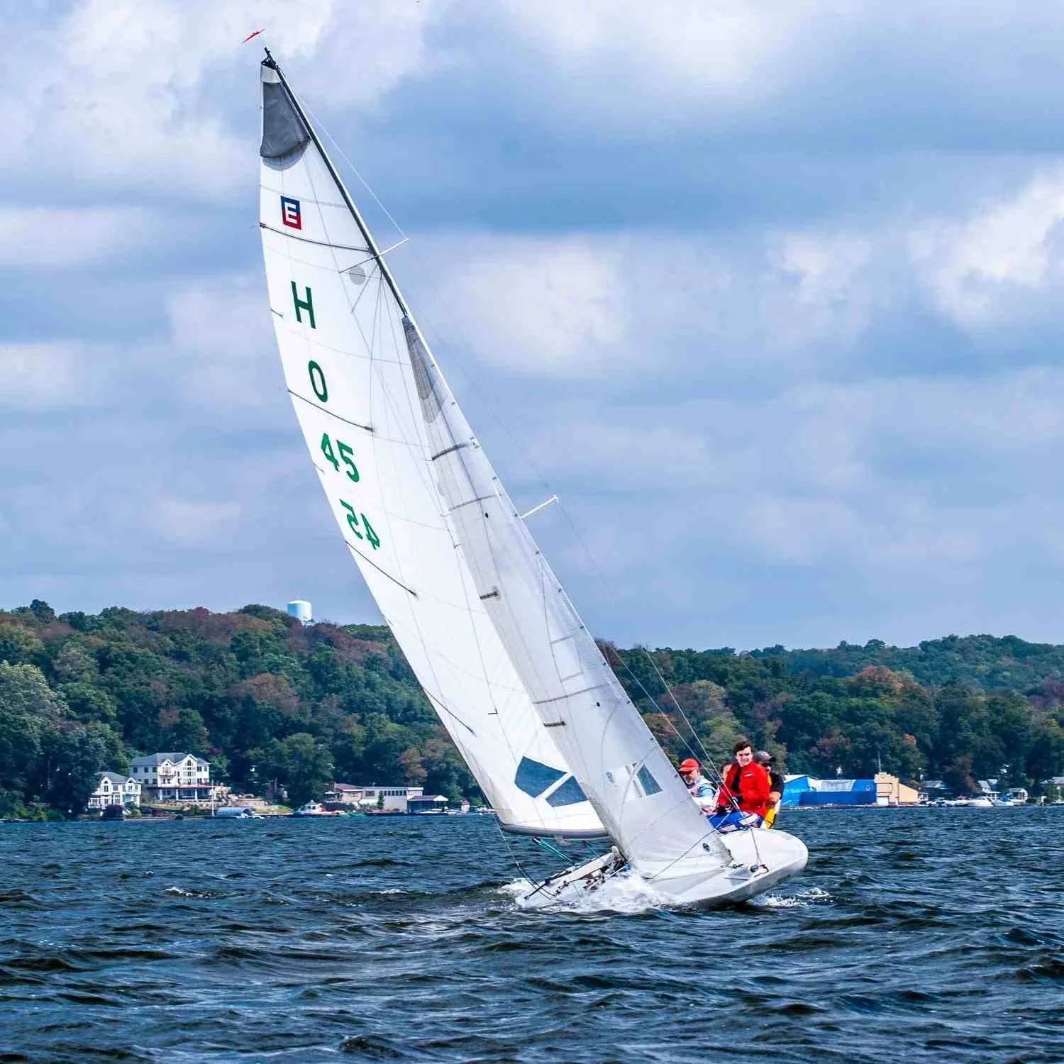 A sailboat on Lake Hopatcong passed us while we anchored.
