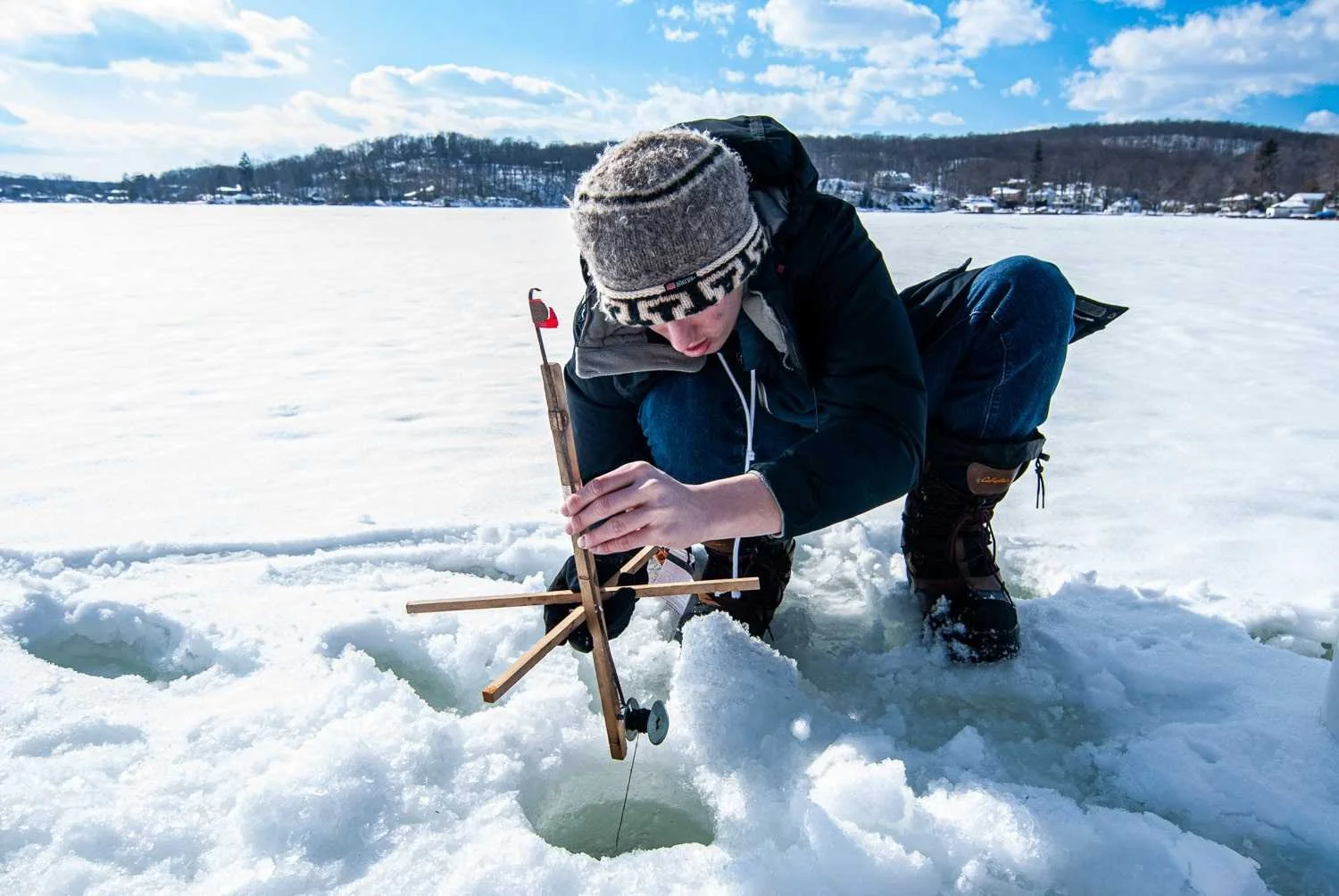 My son, Matt, checks on a tip up.