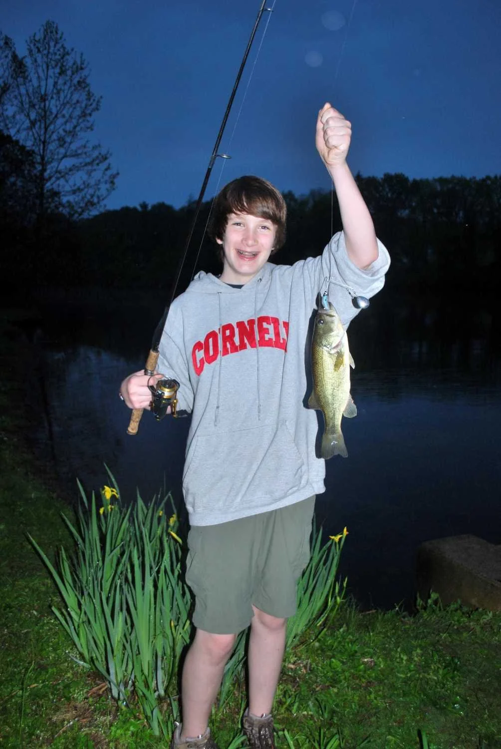His first fish, first cast.