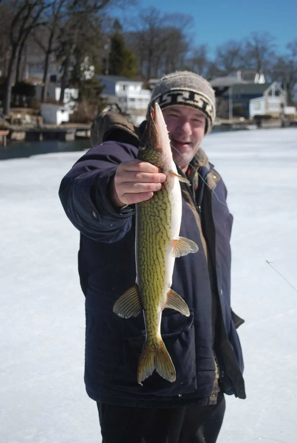 The writer with a good sized pickerel caught near River Styx.