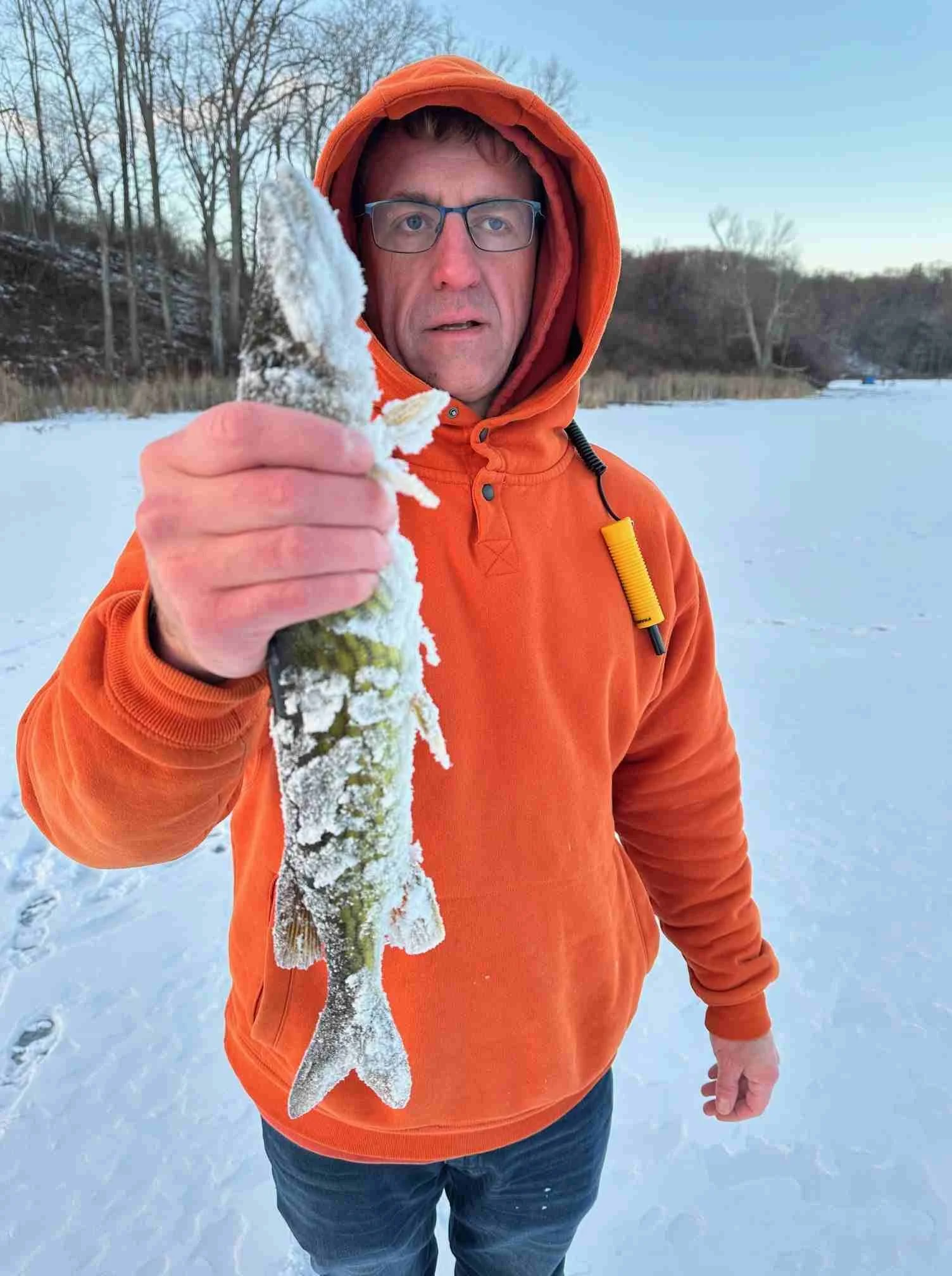 The slime got snow on it, but Oliver got the fish back in the water quickly.