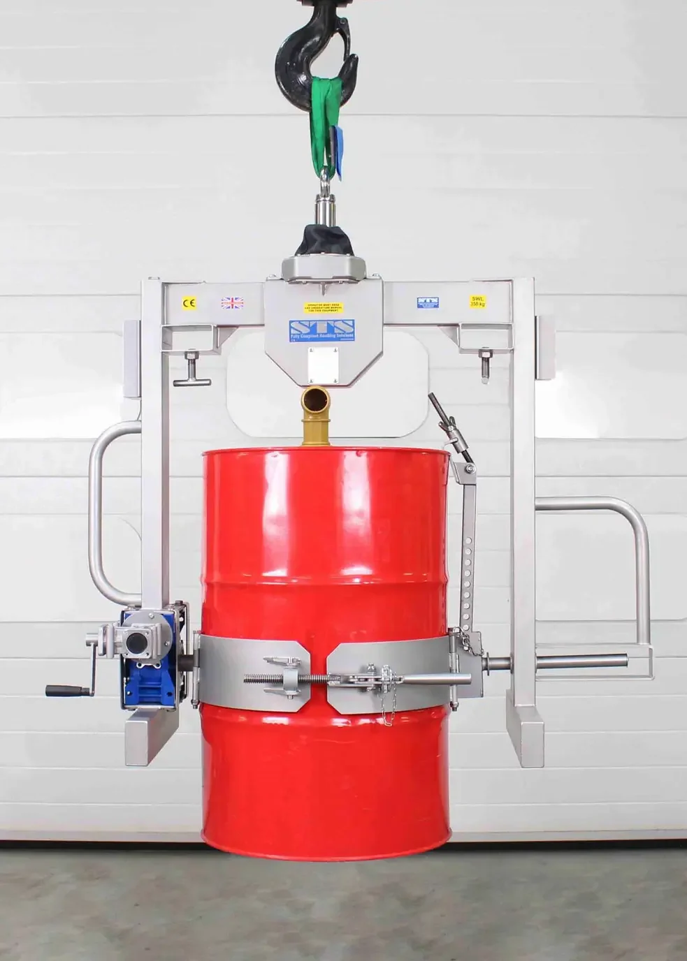 Equipment holding a 55 gallon drum in the upright position