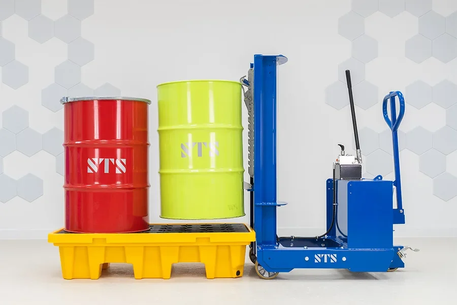 Counterbalance drum lifter placing a drum on a  containment pallet