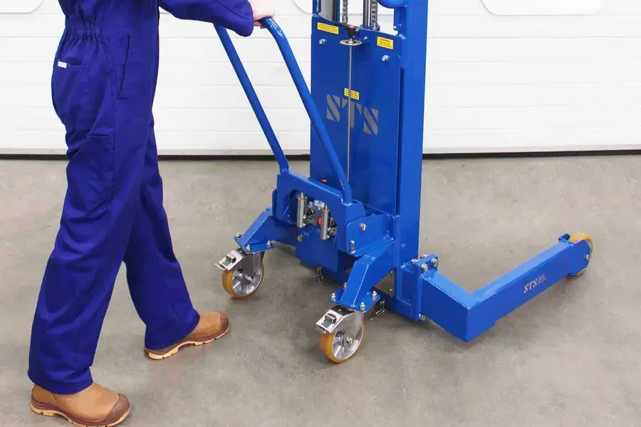 operator demonstrating the manual pump action