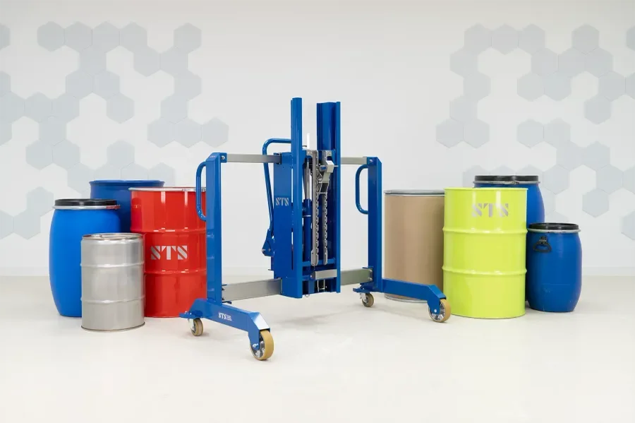Side shift lifter with a collection of drums, fiberboard, plastics barrels of varying heights and steel drums of varying sizes