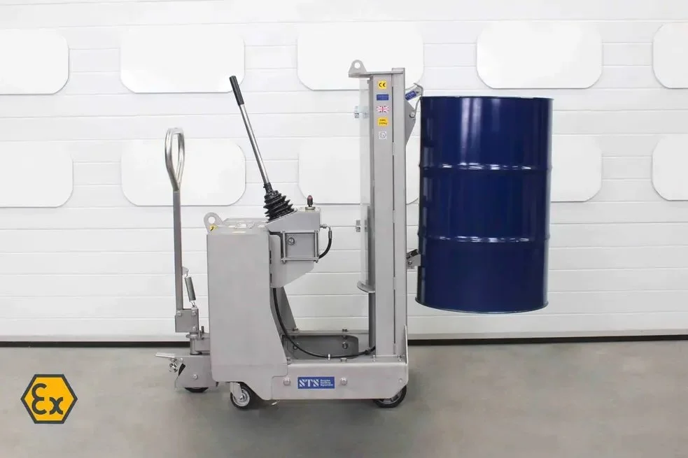 pic of a stainless steel drum lifter holding a 55 gallon steel drum off the ground