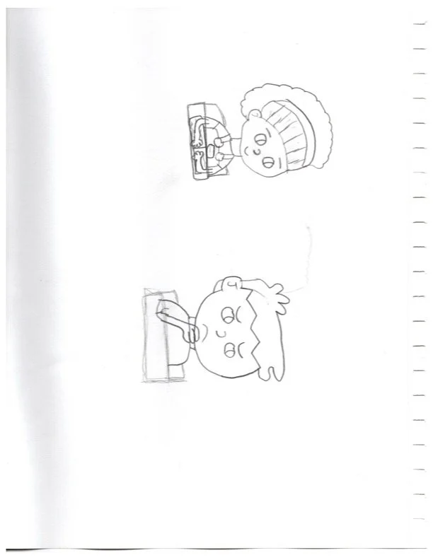 Gus and Maya sitting at desks.jpg