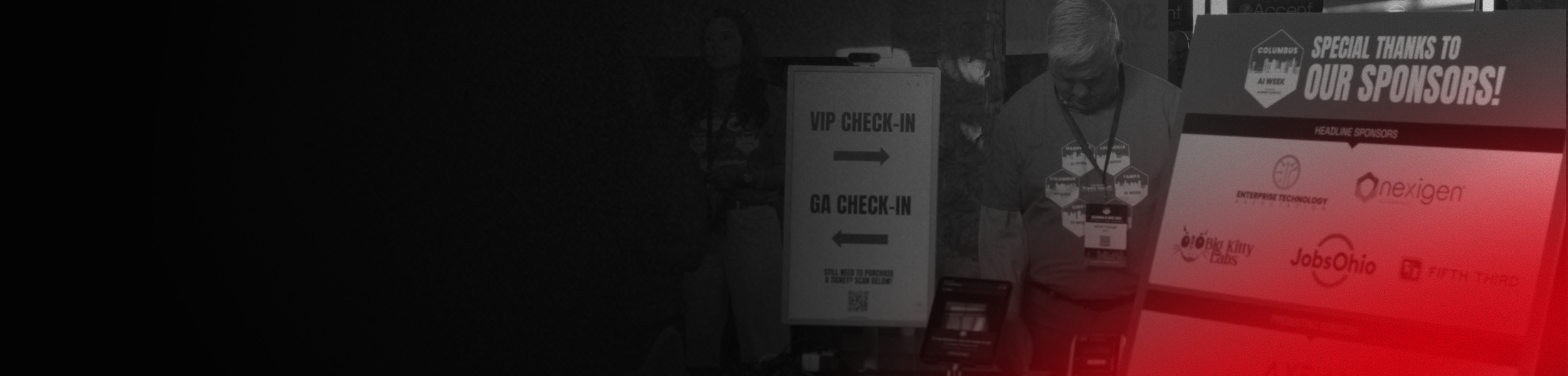 Event registration area with VIP and GA check-in signs, a person with a lanyard, and a sponsor display board.