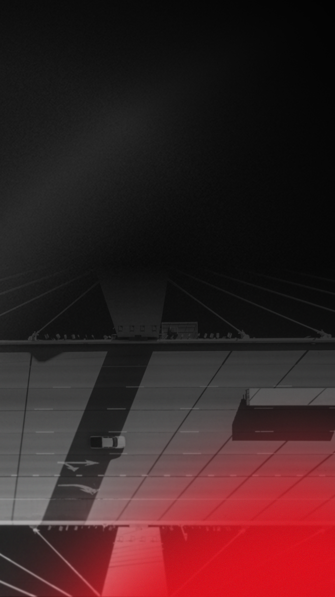 An aerial view of a bridge at night with a car on the road, featuring a red laser grid pattern in the foreground.