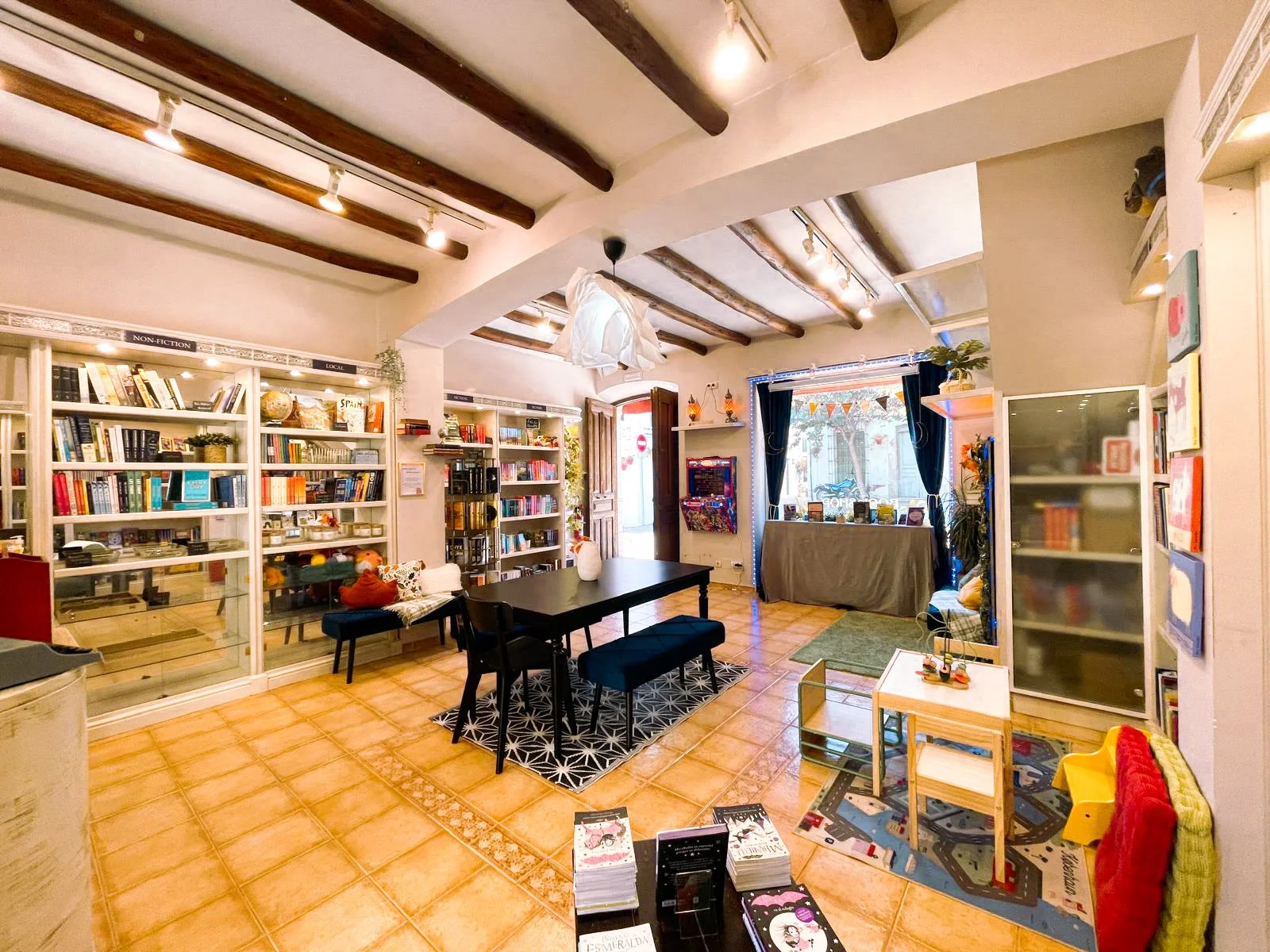 A cozy place to linger, browse, drink a coffee, play a game...