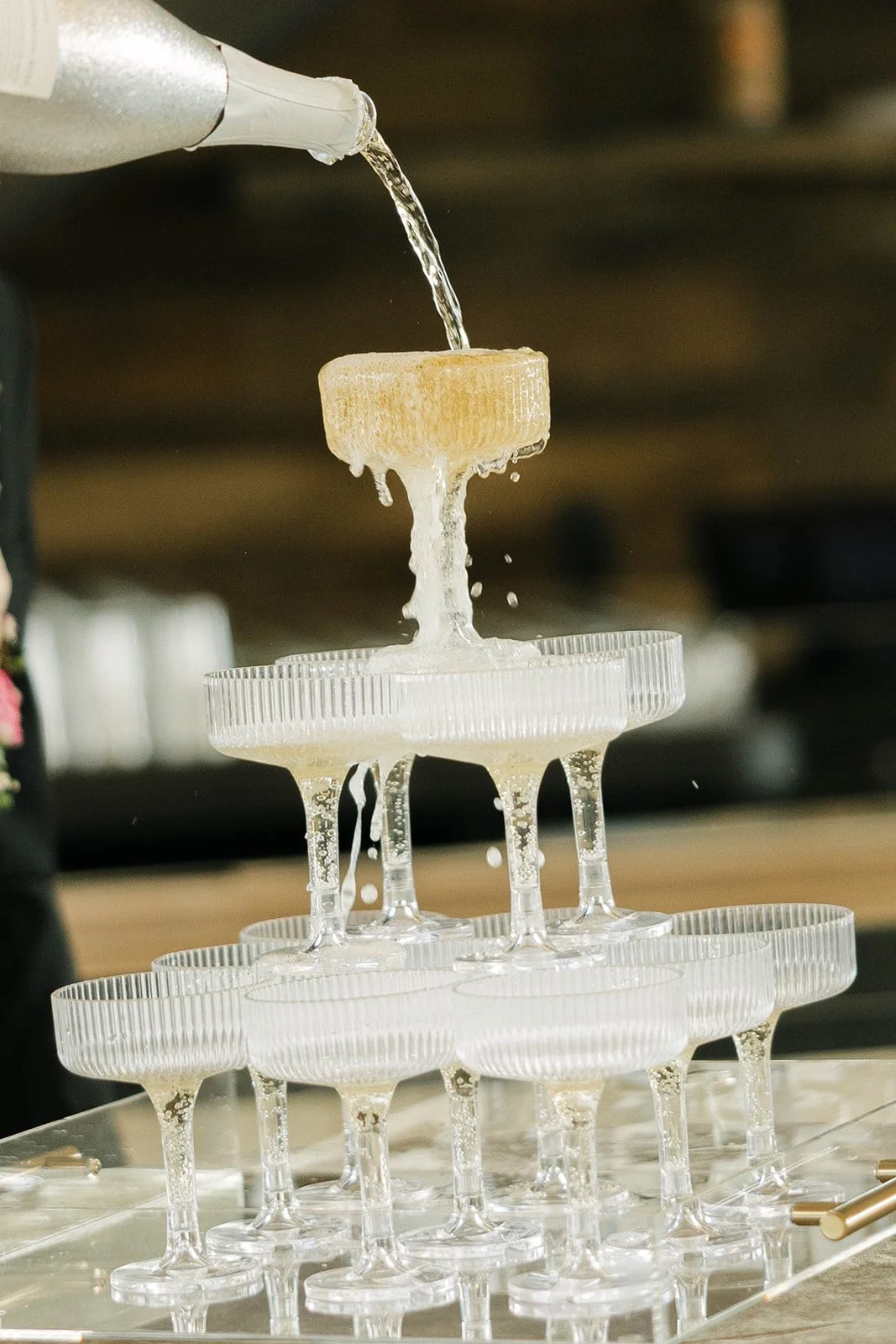 Champagne tower, anyone? 🥂 

Photo: @alexrodriquezphoto 
Planning &amp; Design: @redwoodweddingswi
Decor: @adorneventcompany

#PrairieSpringsVenue #PrairieSpringsEvents #CelebrateAtPrairieSprings #TwoBirdsEventGroup #WeddingVenues #MilwaukeeEvents #