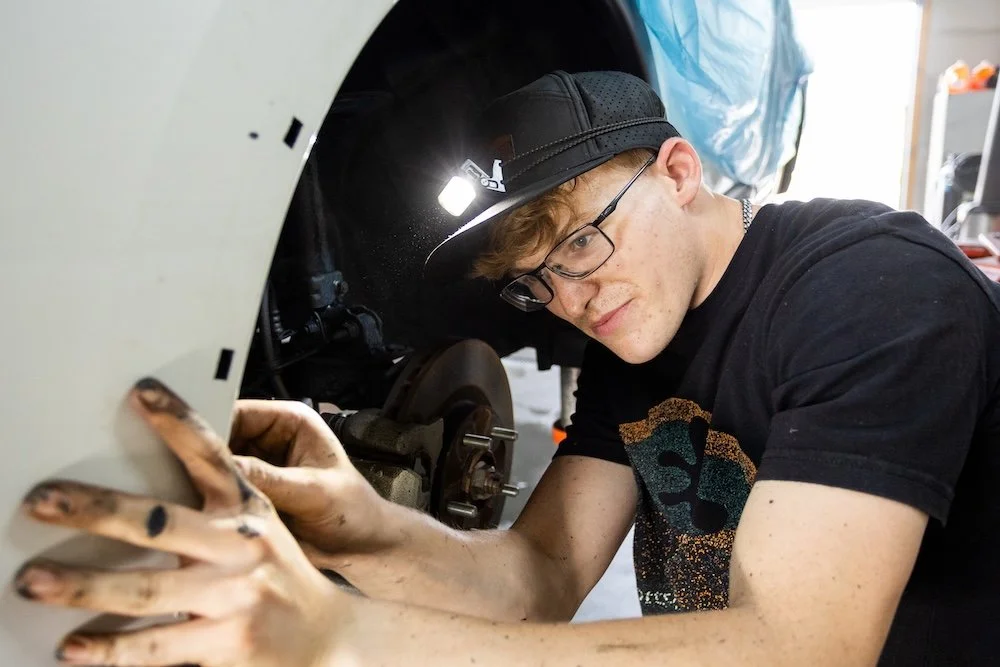gallery - gottschs goo inspecting wheel well.jpg
