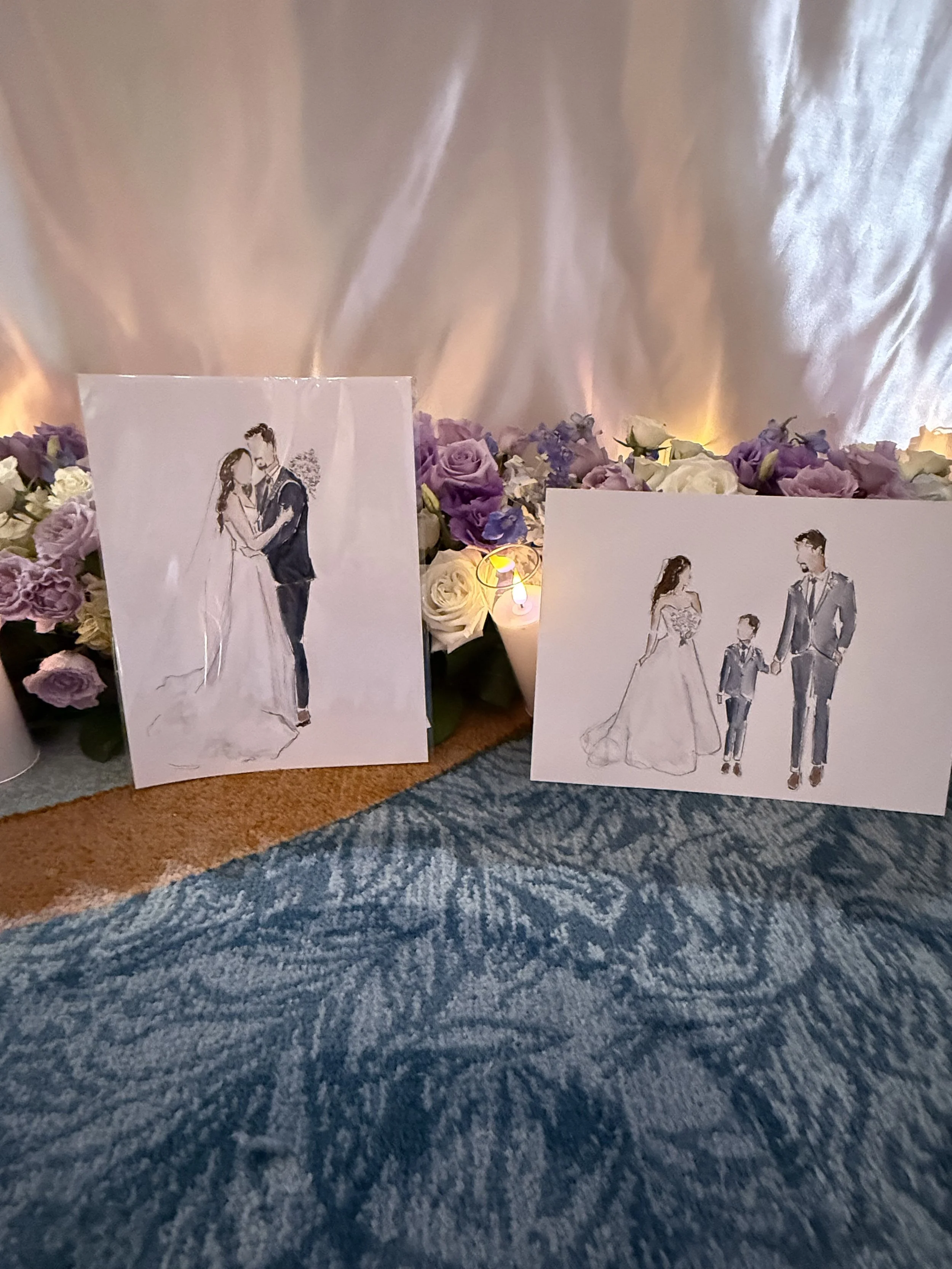 Two wedding illustrations with a bouquet of purple and white flowers behind them, set against a light-colored curtain background with soft lighting.