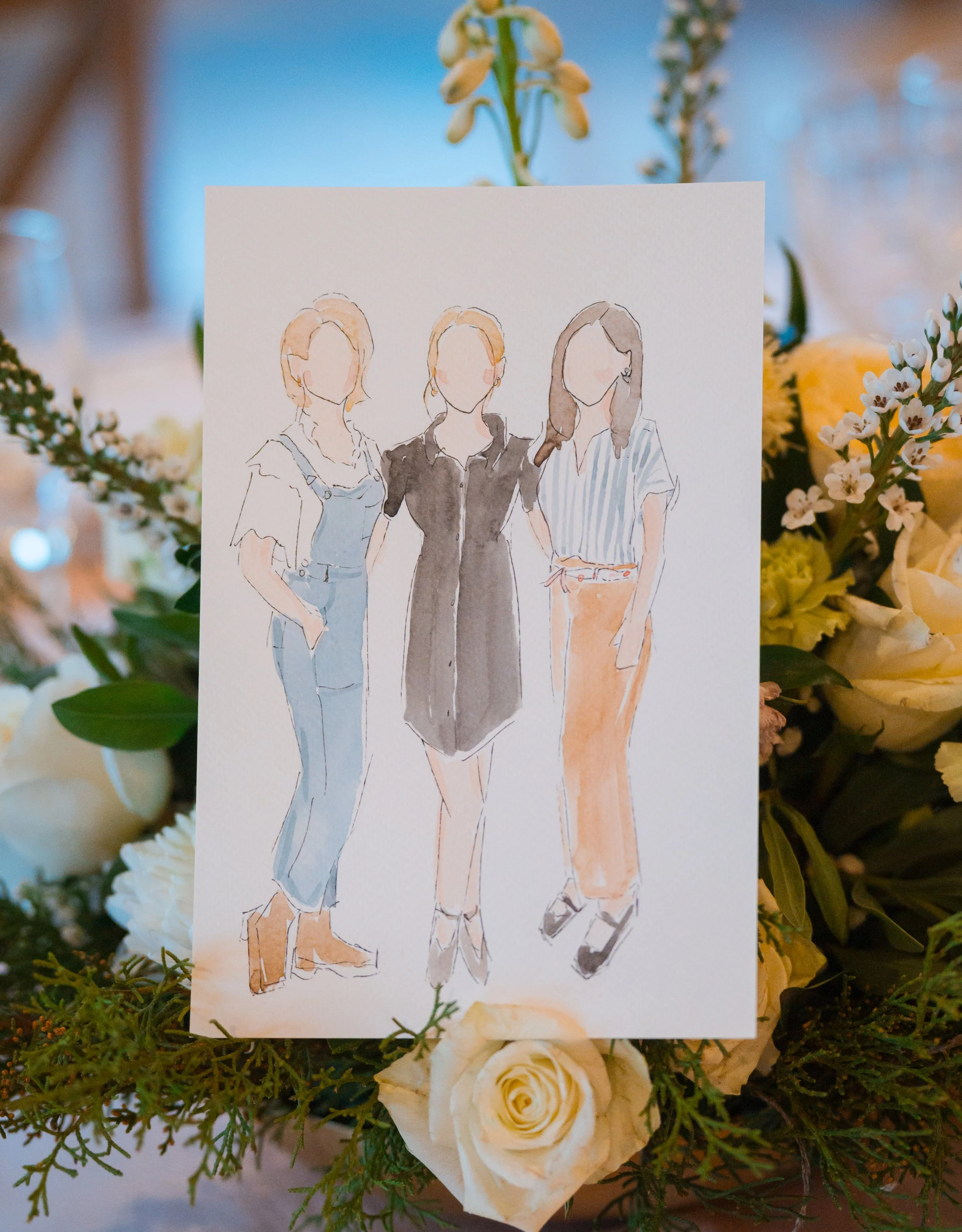 A watercolor illustration of three women, all faceless, standing together on a floral arrangement background with white roses and greenery.
