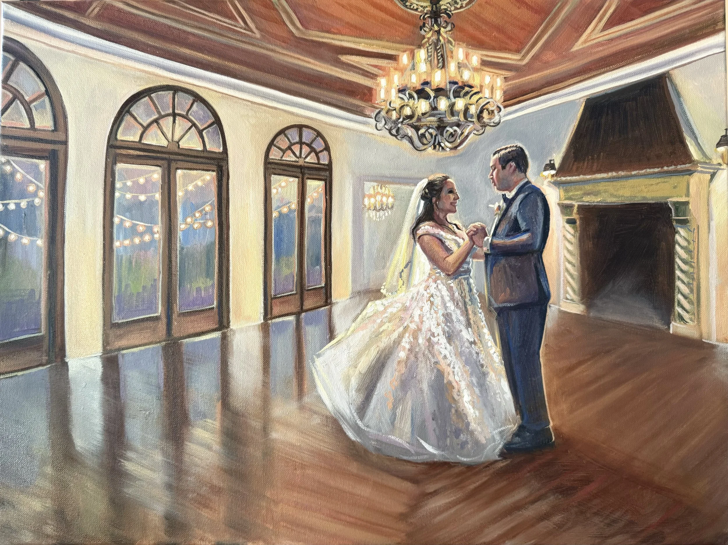 A bride and groom dancing in a decorated reception hall with large windows and a chandelier.