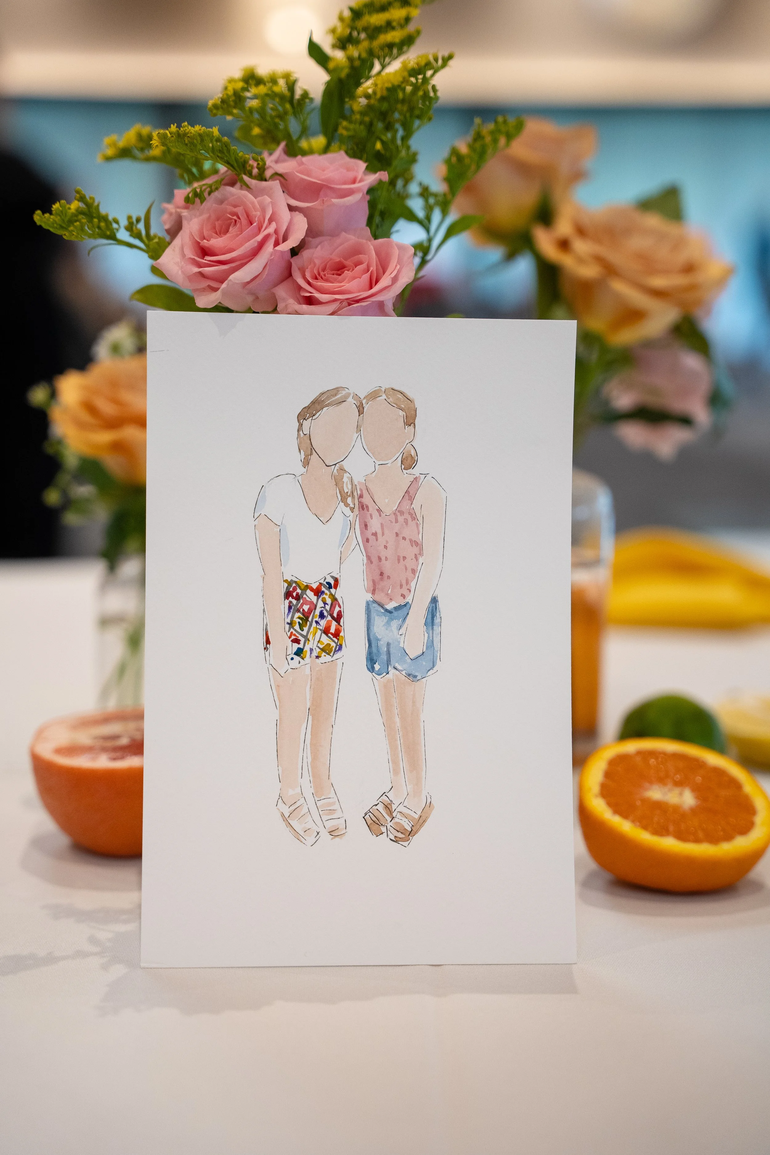 Hand-drawn illustration of two women standing close together, one wearing a white top and colorful shorts, the other in a pink patterned sleeveless top and denim shorts, with their arms around each other, placed in front of a bouquet of pink roses an