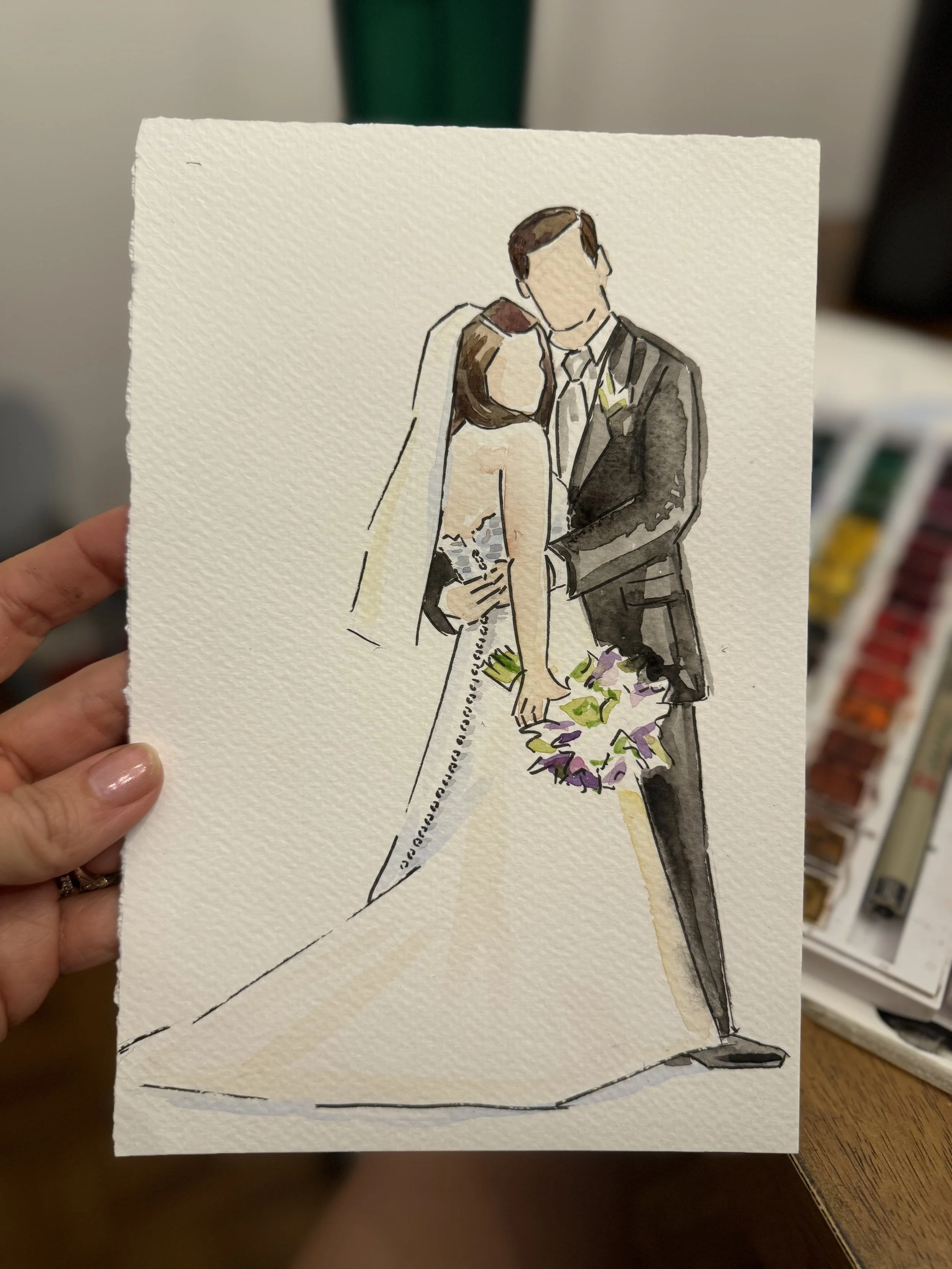 Watercolor illustration of a bride and groom embracing at their wedding, with the bride holding a purple and white bouquet.