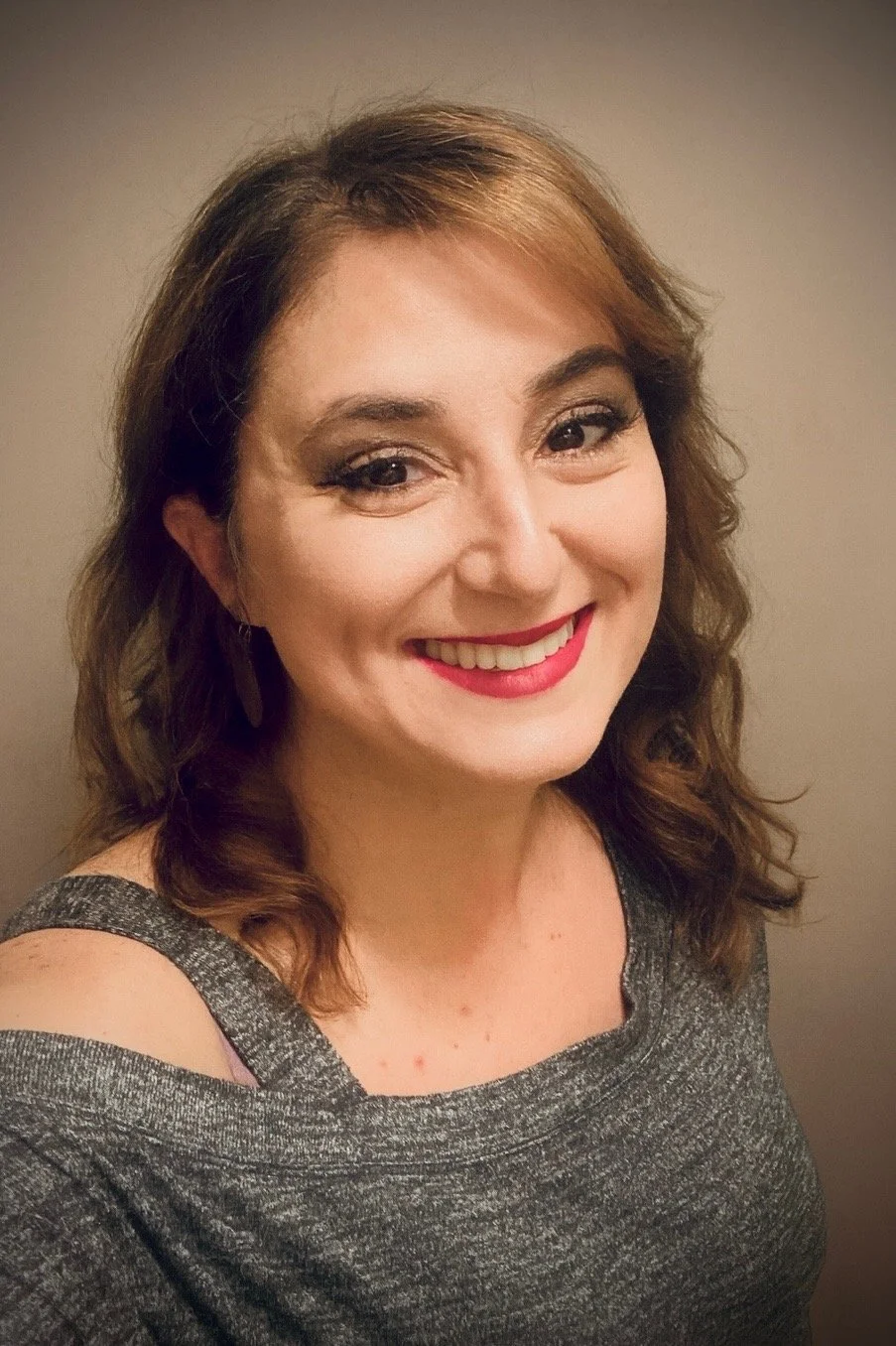 A default gray placeholder image with a user icon.