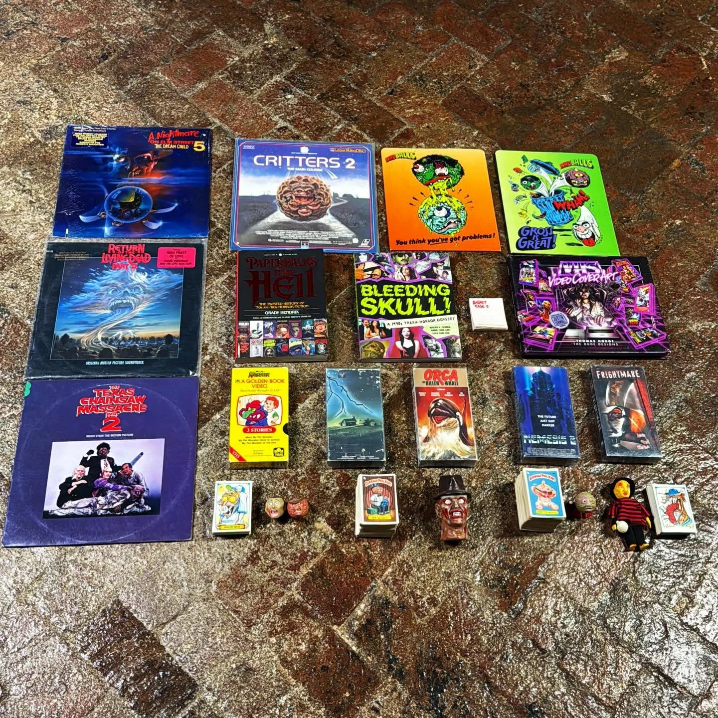 Late museum haul for November thanks to some dope fellas. Shoutout to @vhssensei @lostonvhs @theblackwolf @themagiccitycomics Basket Case 2 promotional rental store notepad is super rad, some great albums for the sounds of horror exhibit we are worki