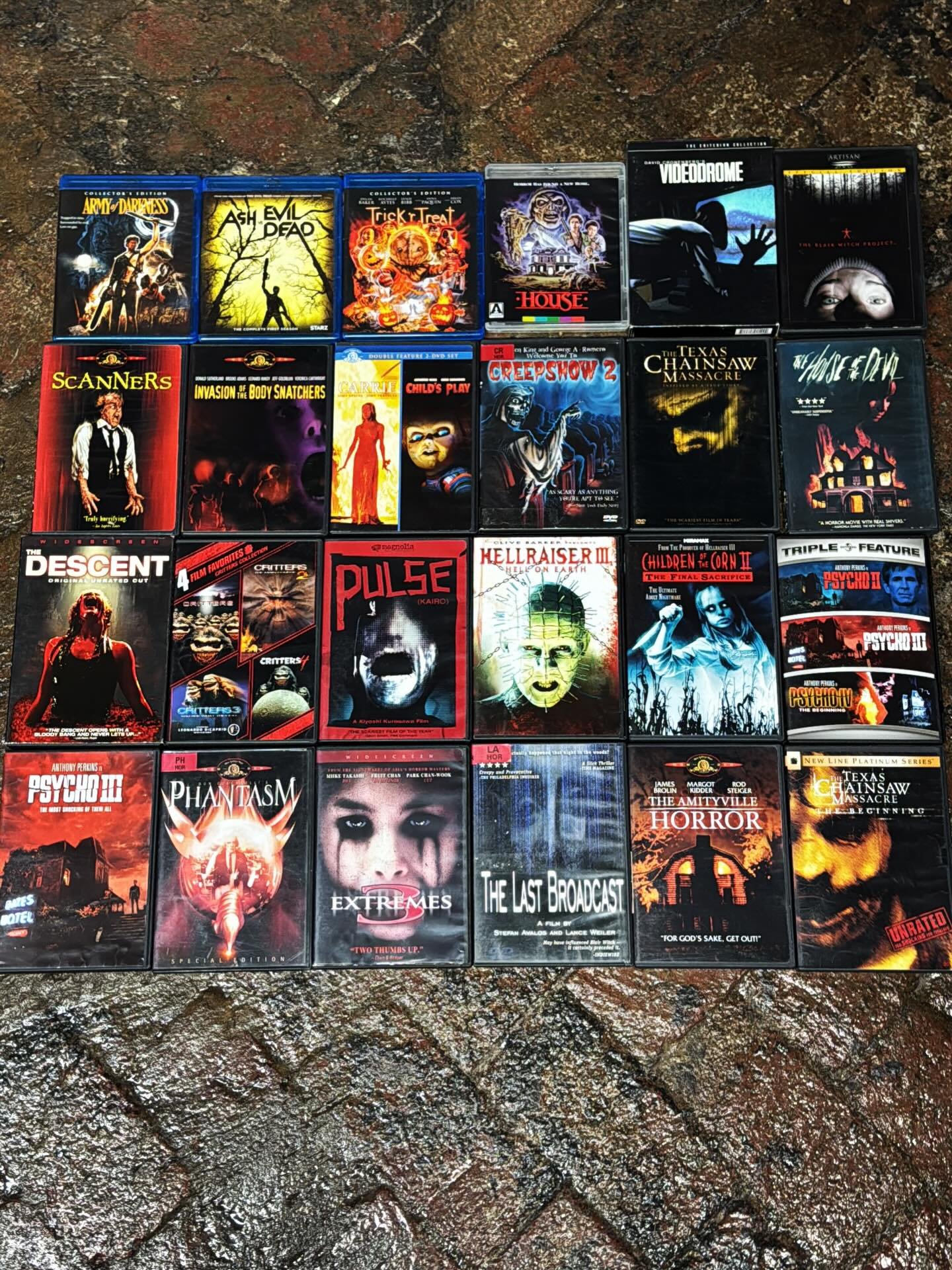 When @broomy.broom came in for his second visit today he brought two things: 1. His amazing parents, And 2. This sick box of donations for the rental library. There&rsquo;s even an @arrowvideo House and a @criterioncollection Videodrome! We are so lu