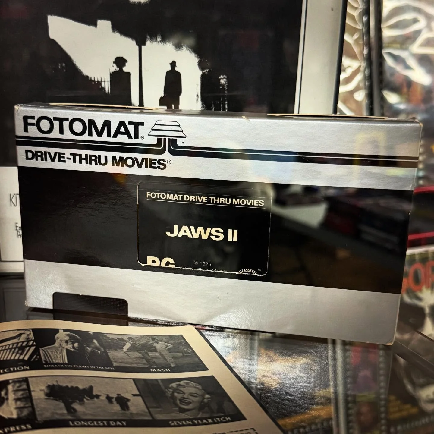 Fotomat drive-thru movie rentals were wild! It lasted from 1979 until 1982.  You would look through their catalog and find the movie you wanted, then call a 1-800 number to order the movie. It would be available the next day for pickup at their littl