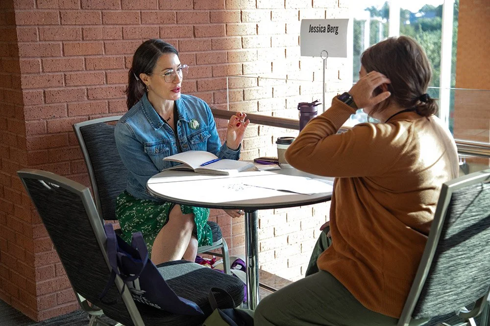Jessica Berg giving notes to a writer in a one-on-one pitch session