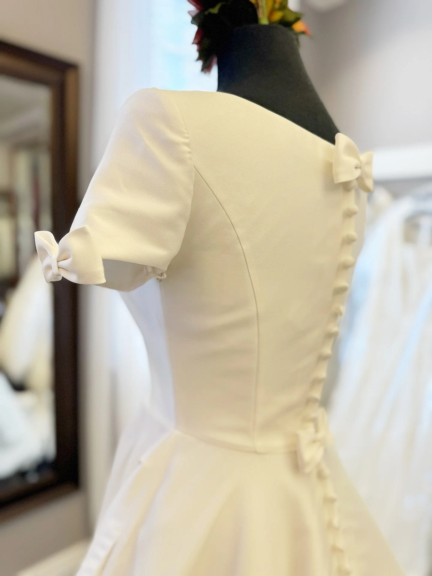 A big reminder of our 💸C L E A R A N C E  S A L E💸going on right now, through 10/31, and a little moment for the bows that will always be in style 🎀

Reserve your appointment now through 10/31 to find your dream designer gown for as low as $399 🔔