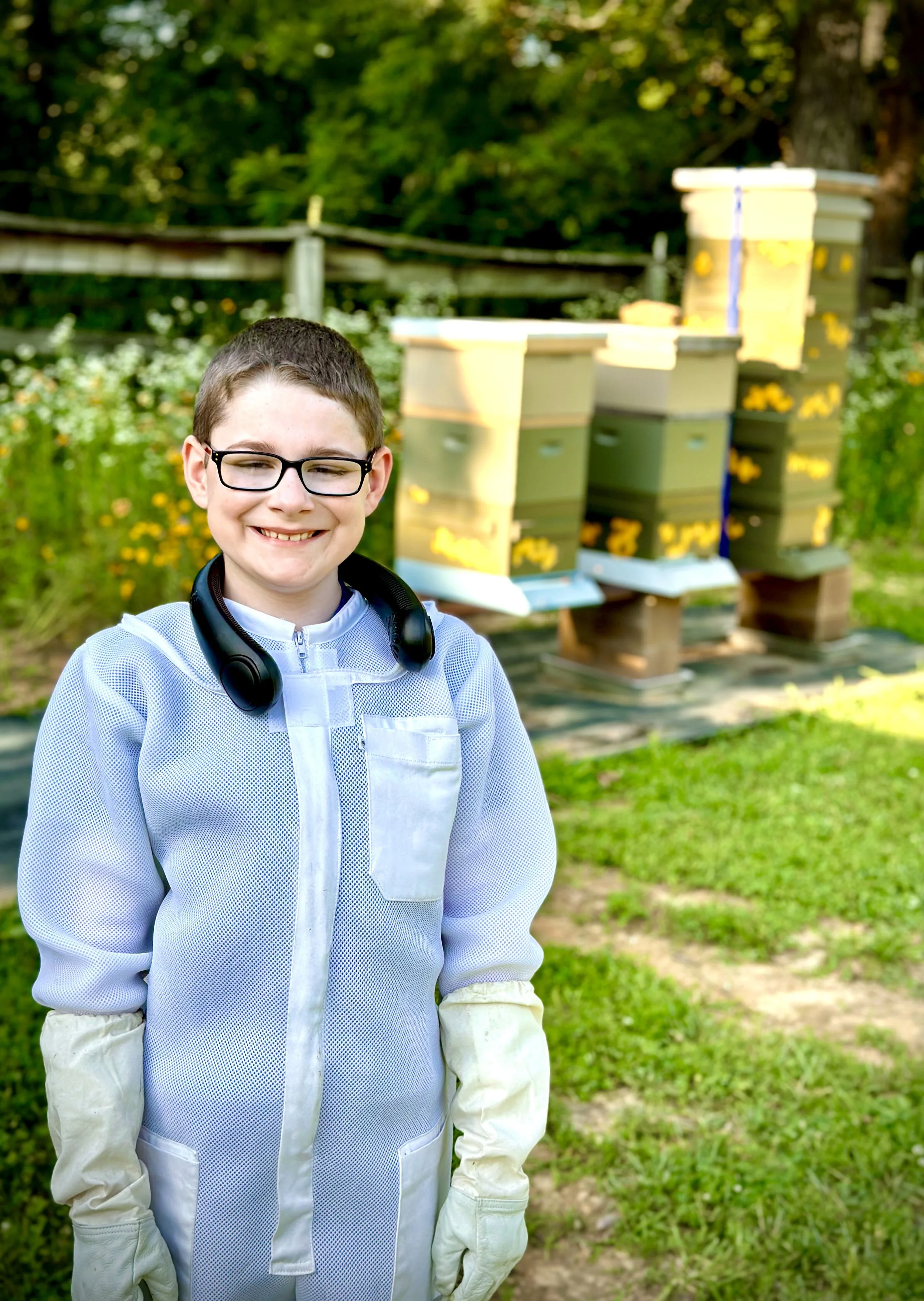 Camden Miller in white bee suit