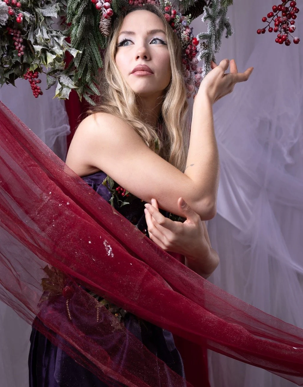 Winter has a way of pulling your eyes upward. A quiet moment, a breath, a little imagination.

@anna_volynets_ on @studioluminescence Winterberry set, with beautiful makeup by @lisavetamua &mdash; a scene that felt like stepping into a storybook.

#W