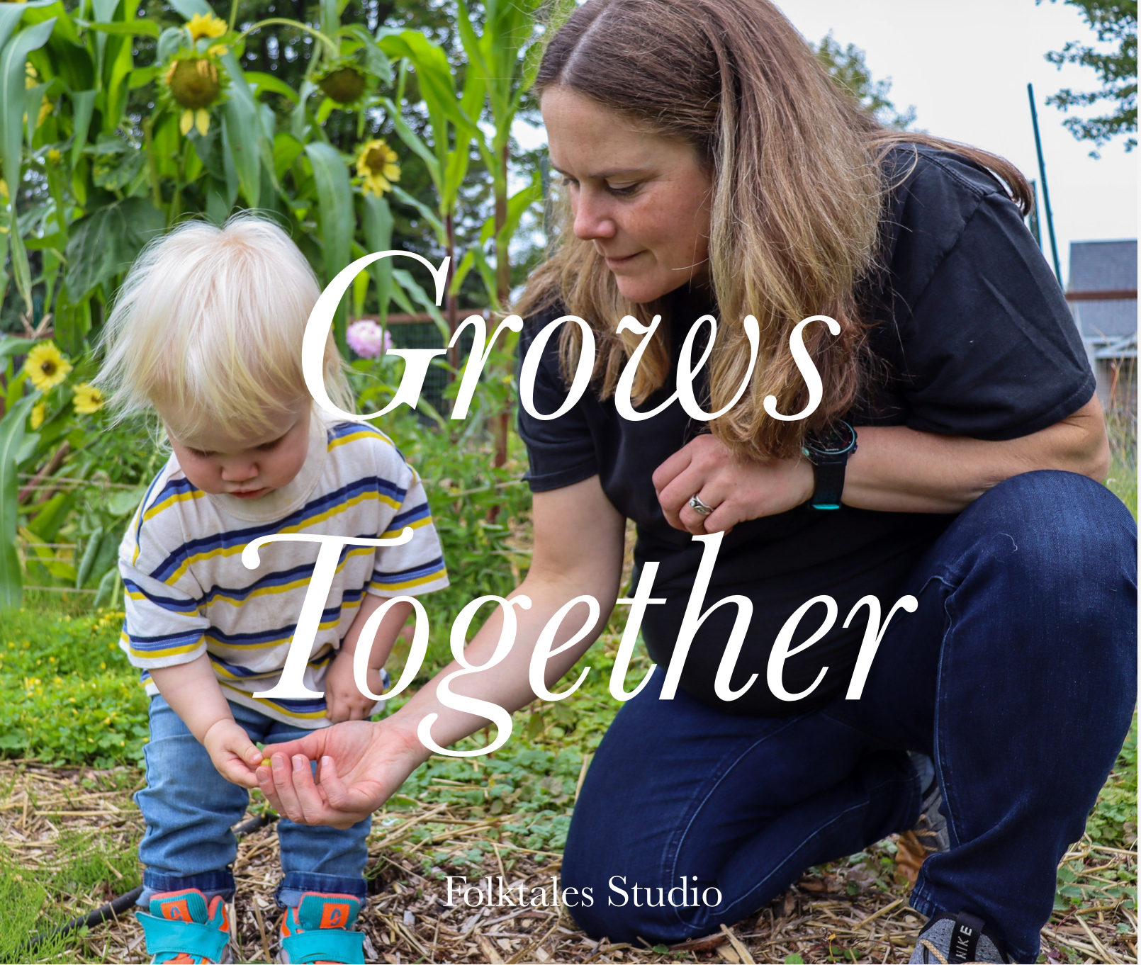 A woman and a young boy in a garden gathering vegetables, with flowers and plants around them, overlaid with the text 'Grows Together' and 'Folktales Studio.'