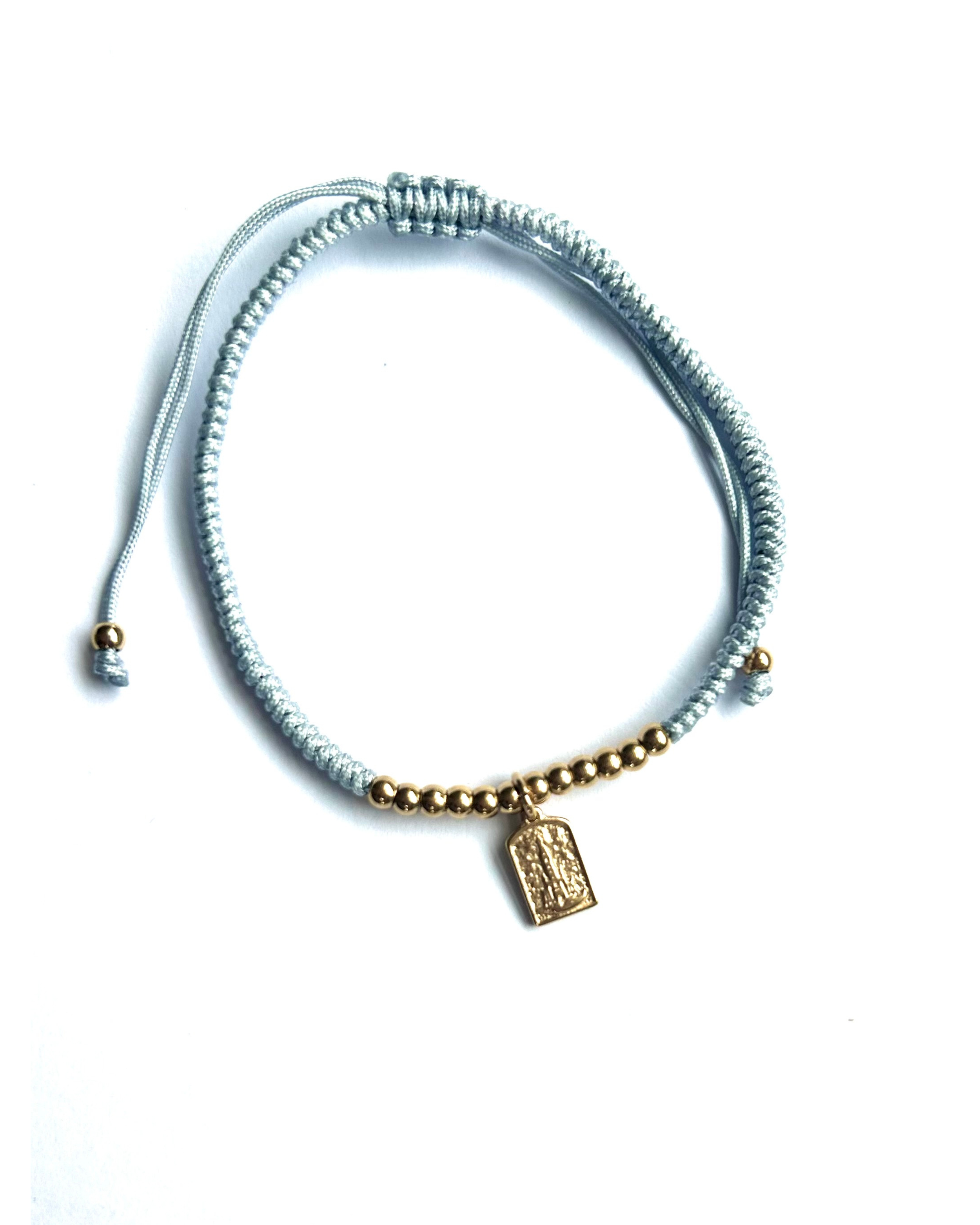 pulsera de acero y Virgen de Fatima