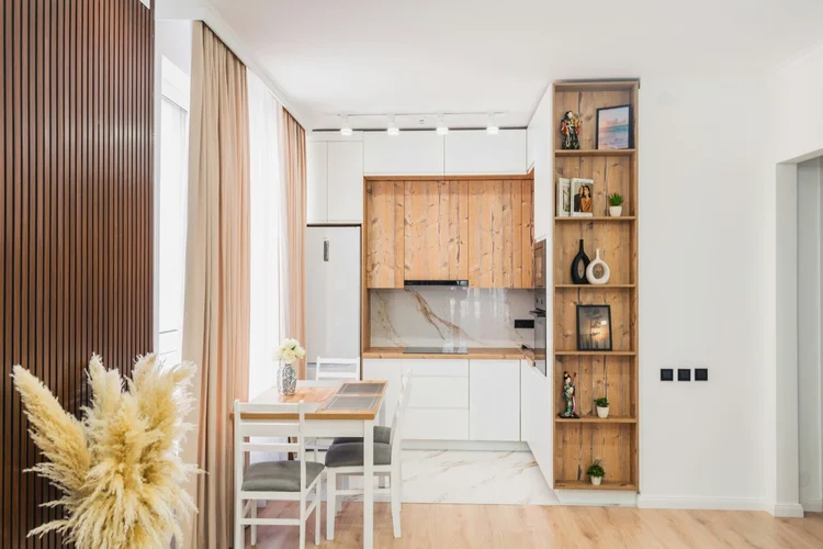 A bright, furnished kitchen and dining area ready for tenants
