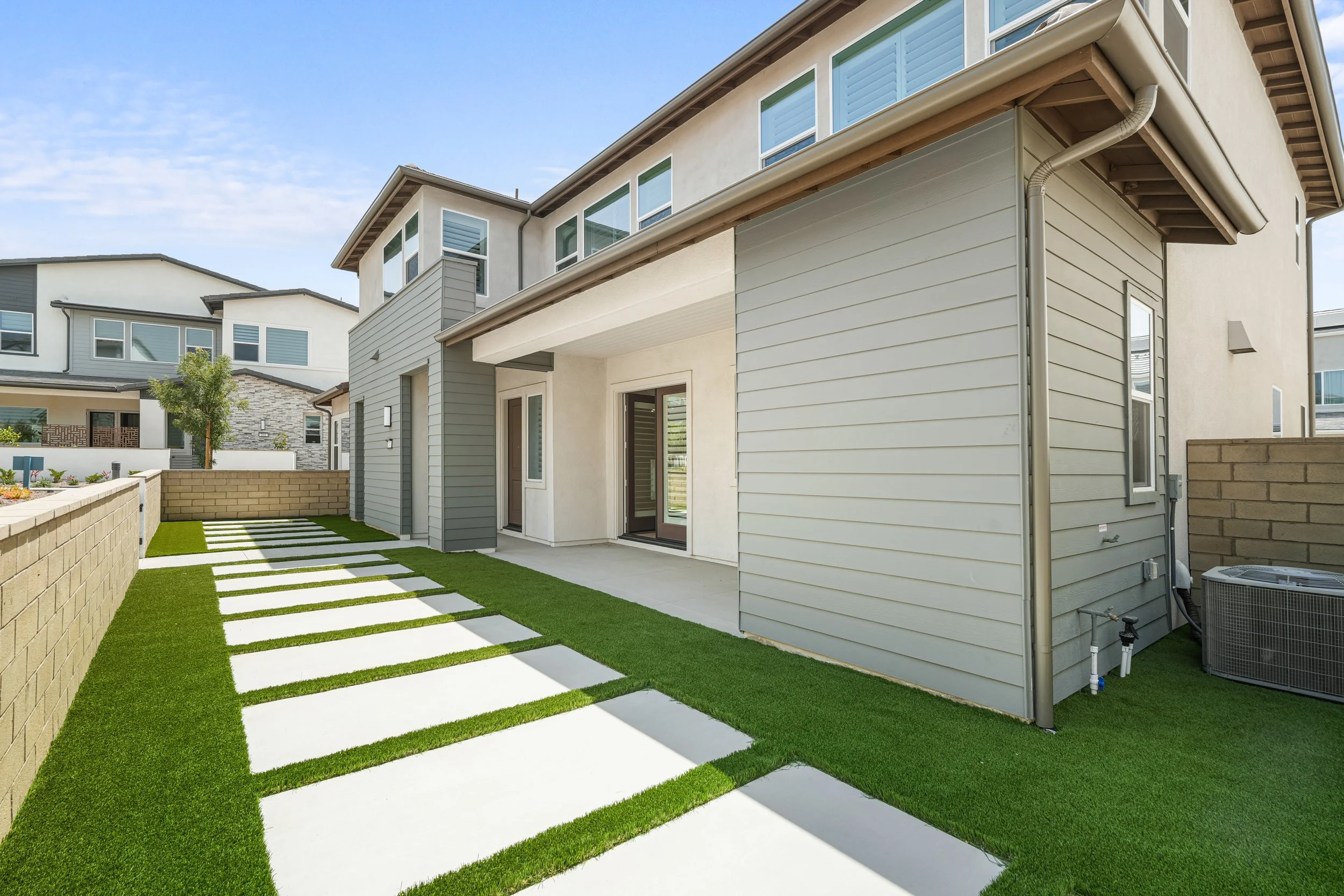 sora-irvine-luxury-home-landscaped-backyard.jpg