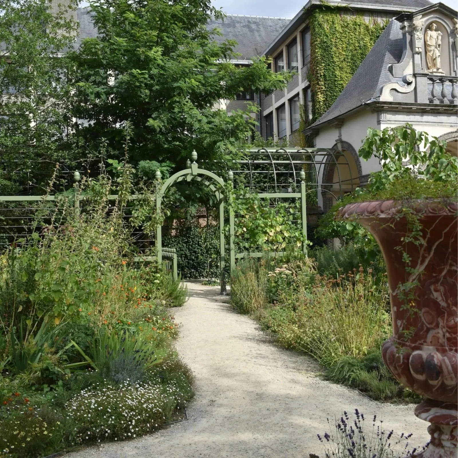 A gravel path winds through the garden at Rubenshuis in Antwerp.