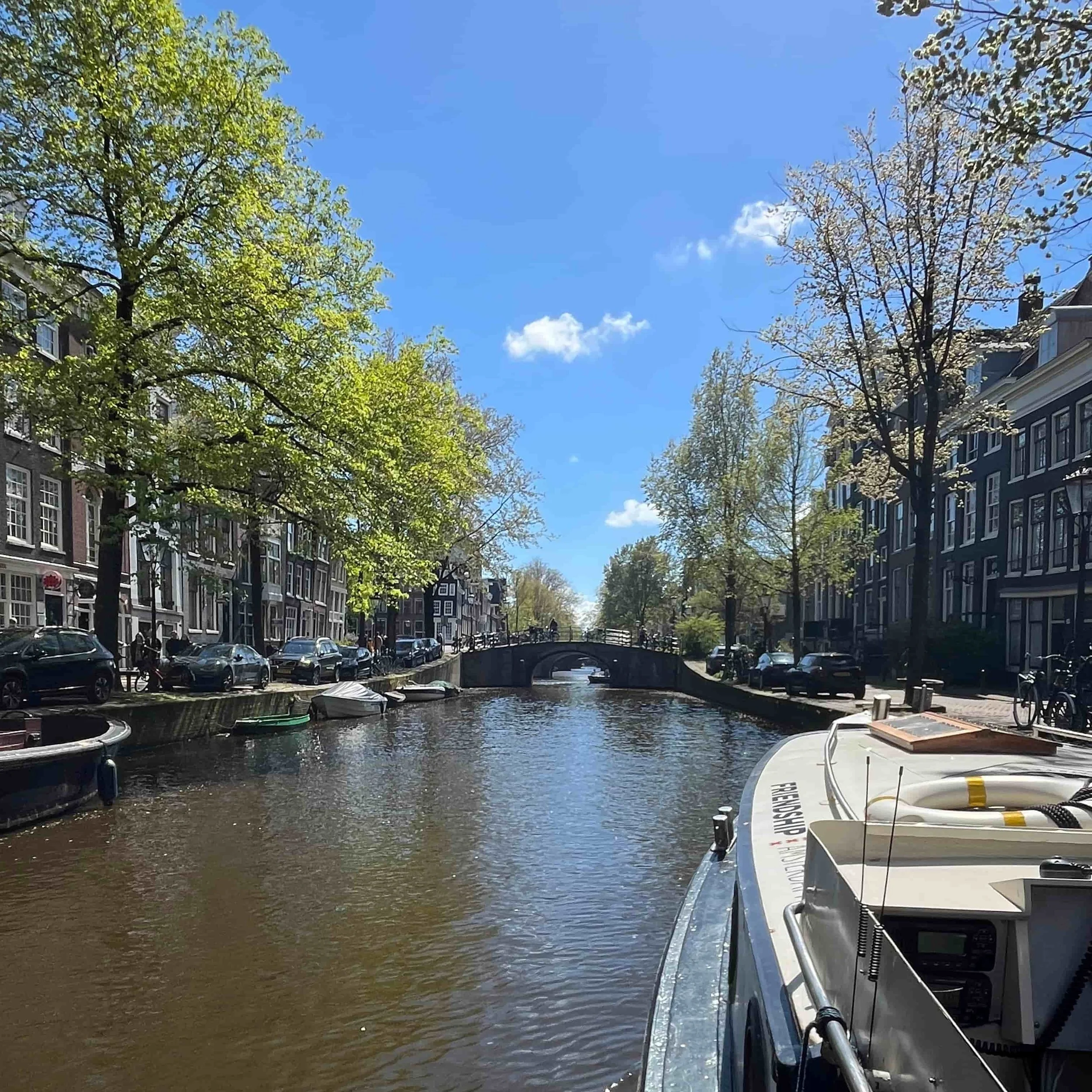 A view of Amsterdam from a boat on the canal.