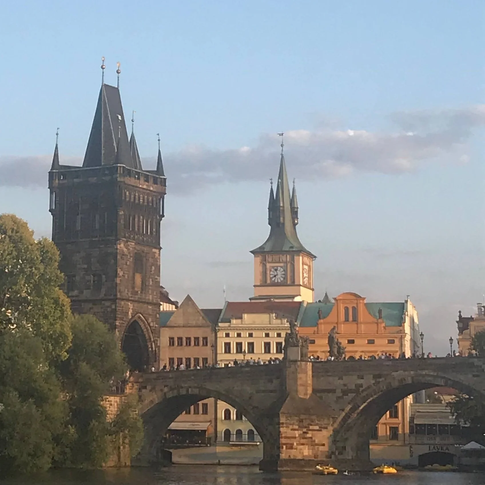 A view of the Charles Bridge in Prague from the Vltava River.