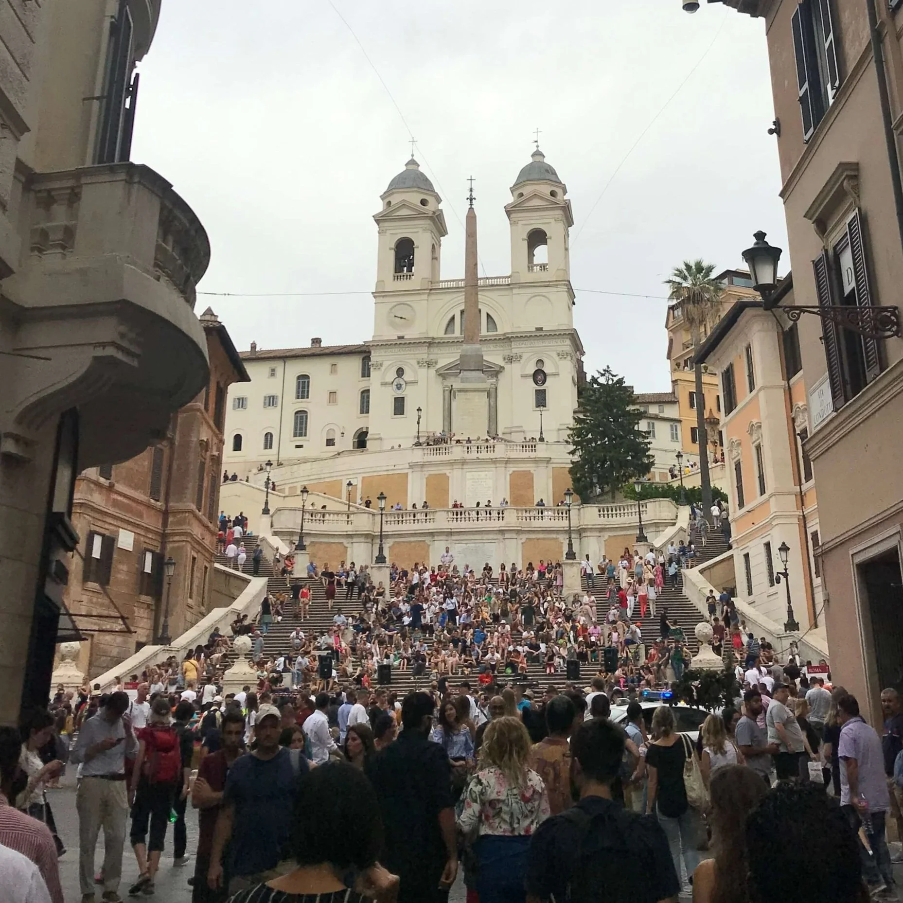 A crowd of people on the Spanish Steps.