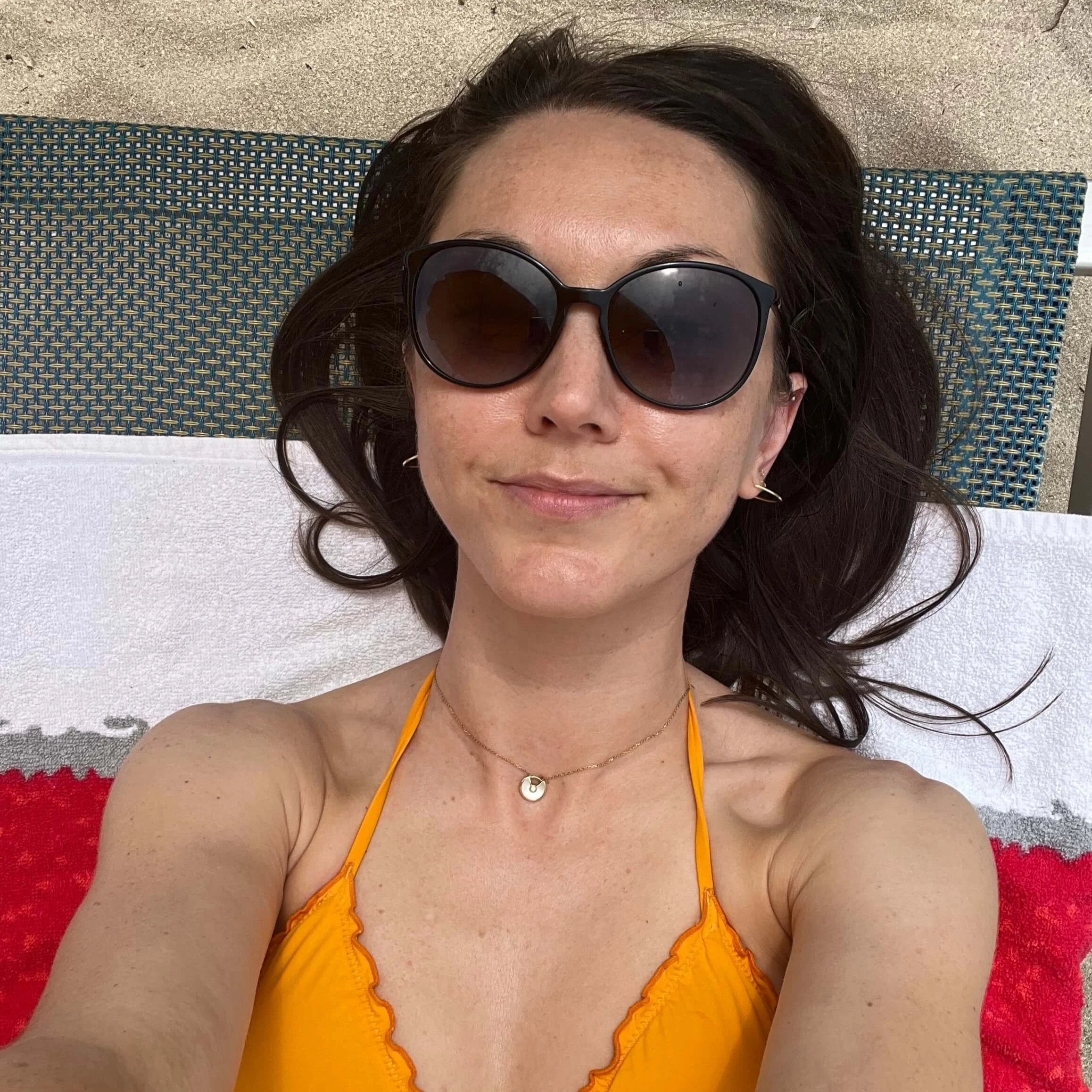 A selfie of the author while relaxing at an Italian beach club.