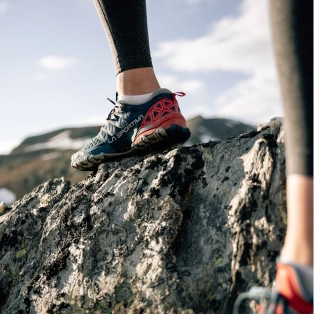 A close up of trail running shoes for hiking in Europe.