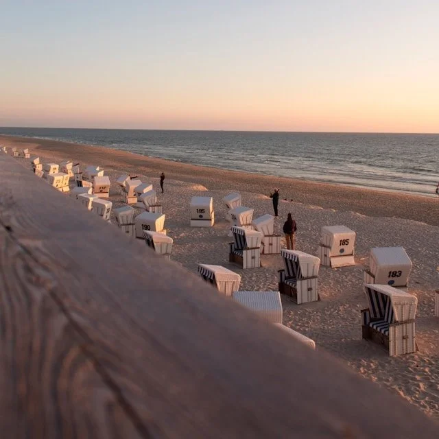 Strandkorbs are special beach chairs that block the wind, here in Sylt.
