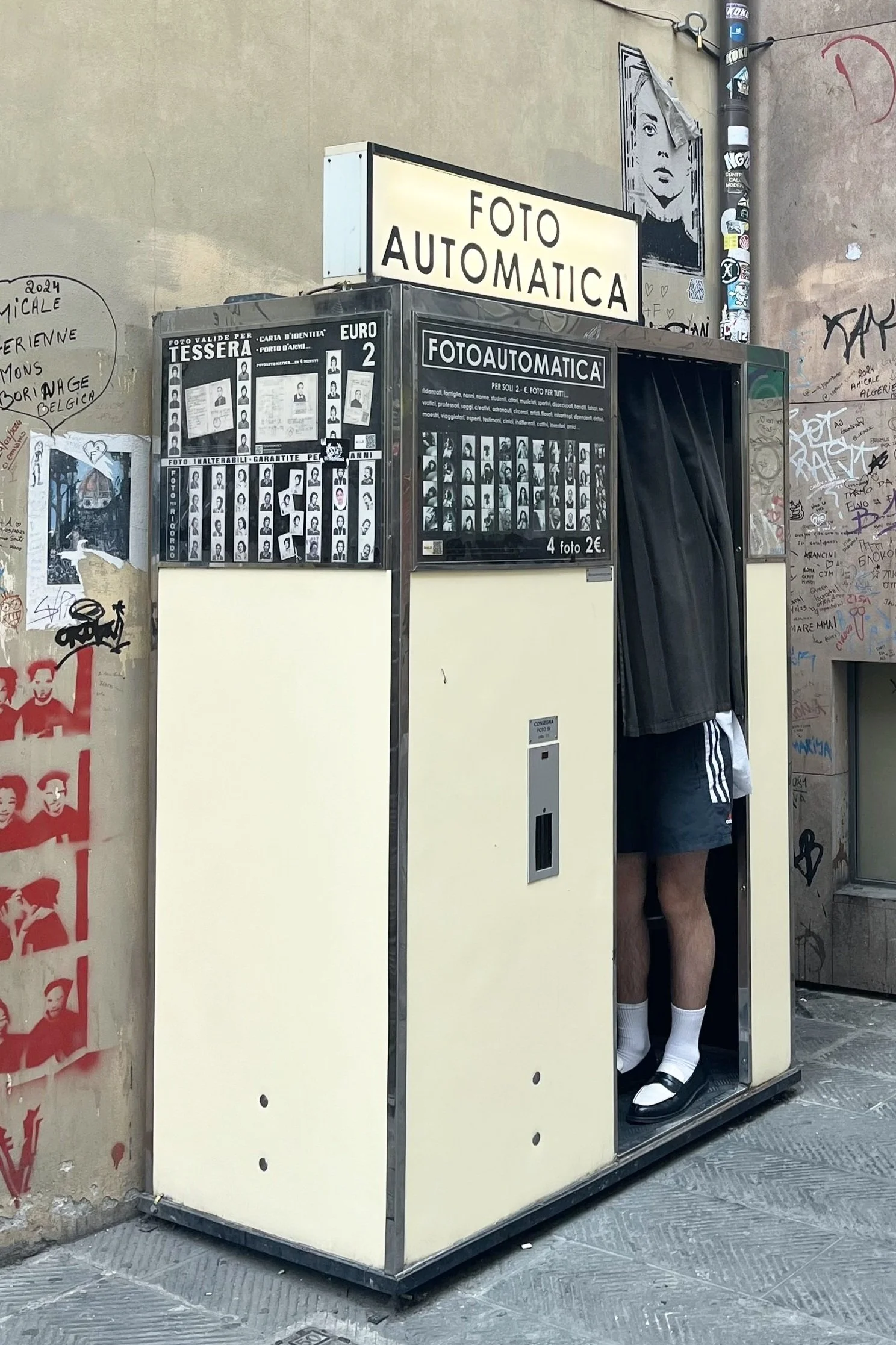 An automatic photo booth, Foto Automatica, on via del Proconsolo in Florence, Italy
