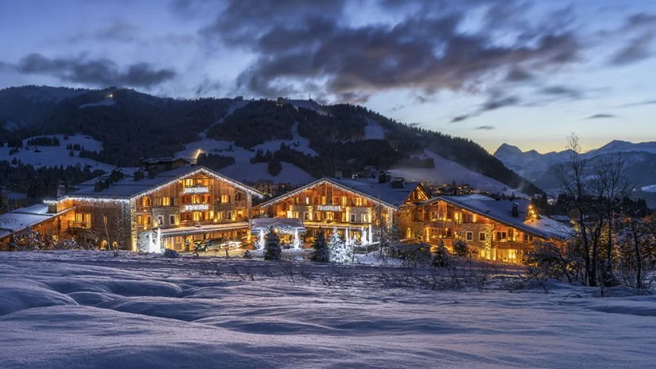 The Four Seasons Hotel Megève on a snowy night in the French Alps.