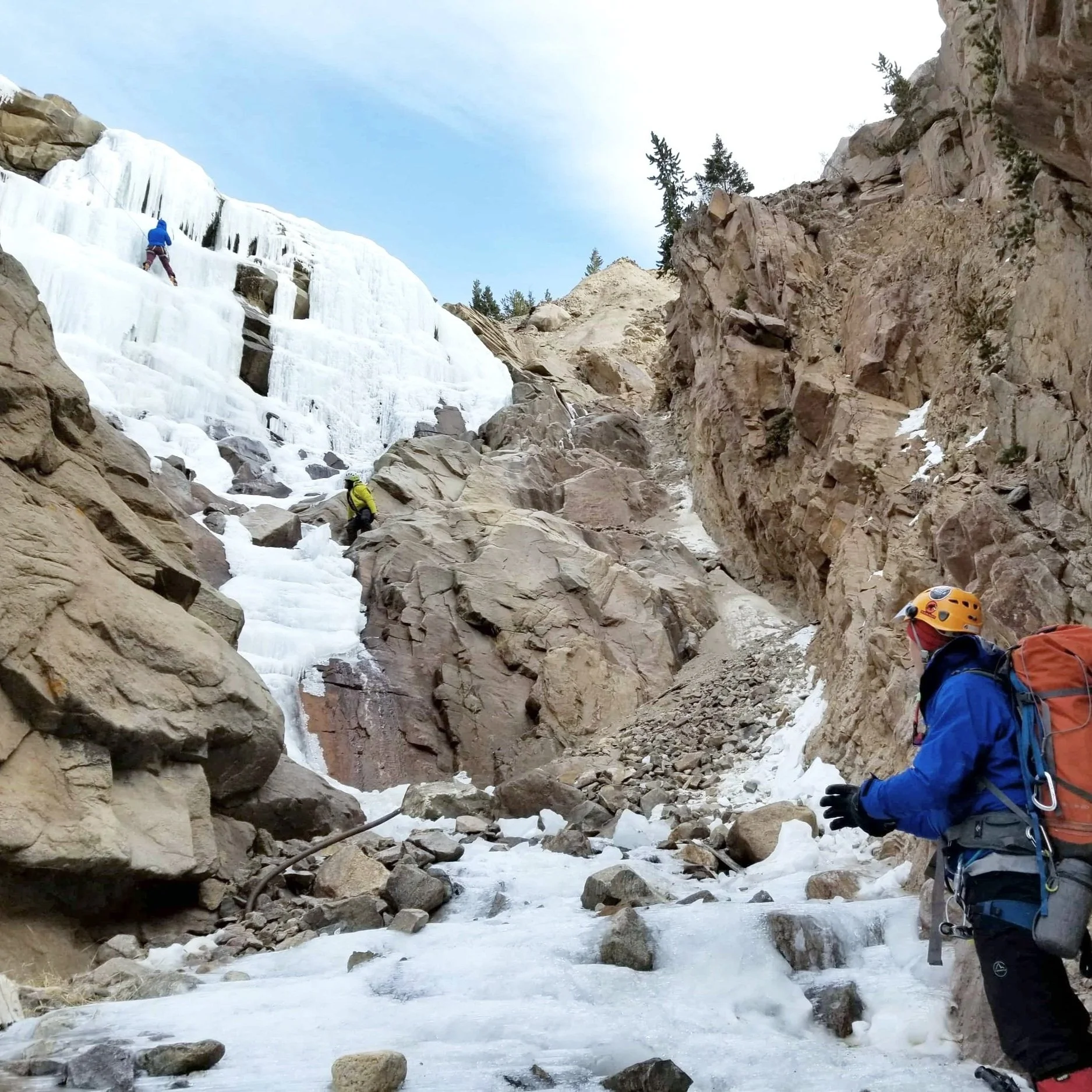 Two people ice climbing in France.
