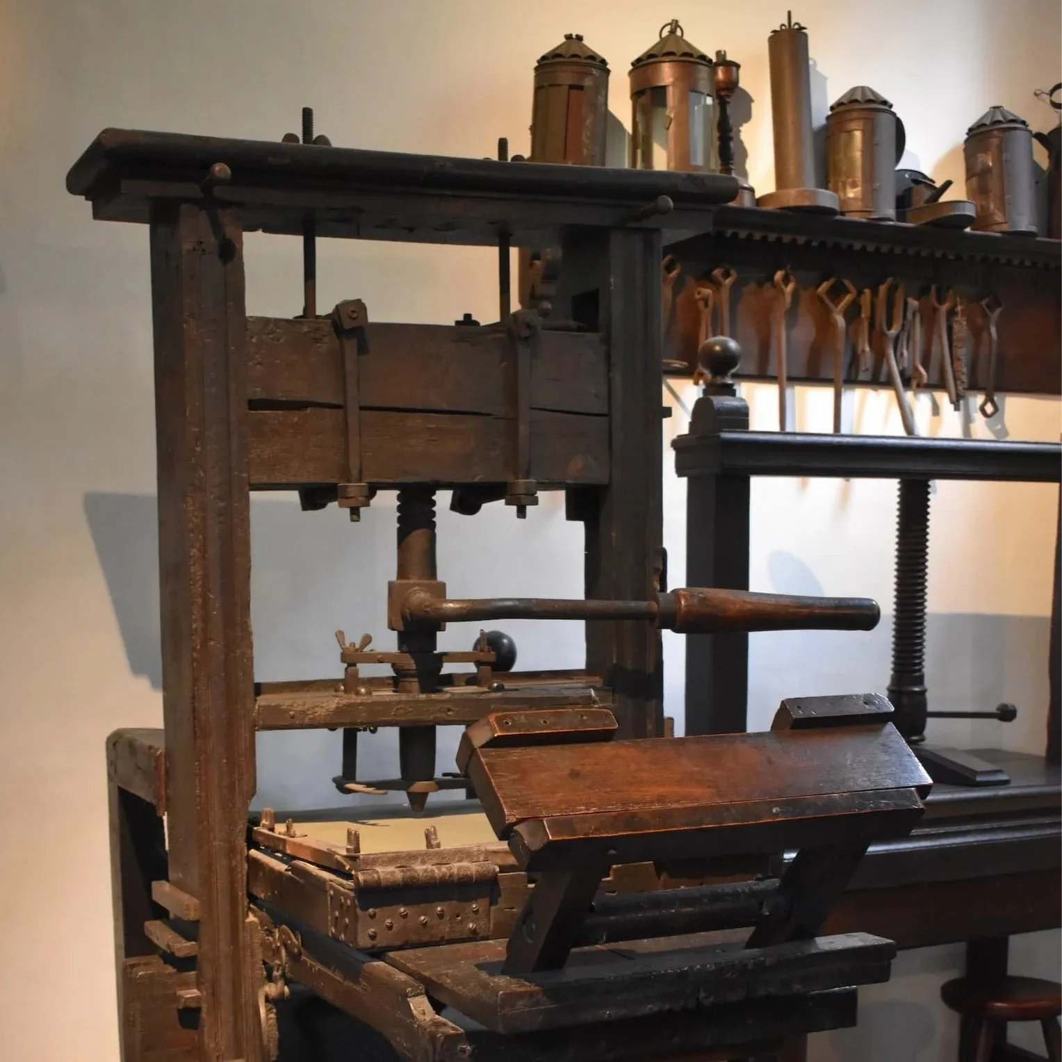One of the historic printing presses on display at the Plantin-Moretus Museum.